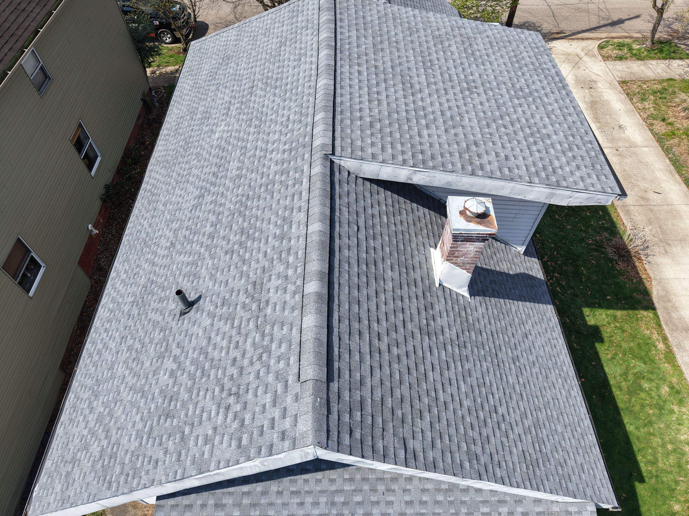 Residential Roofing Installation using GAF Timberline HDZ Oyster Grey by Rainstoppers Roofing