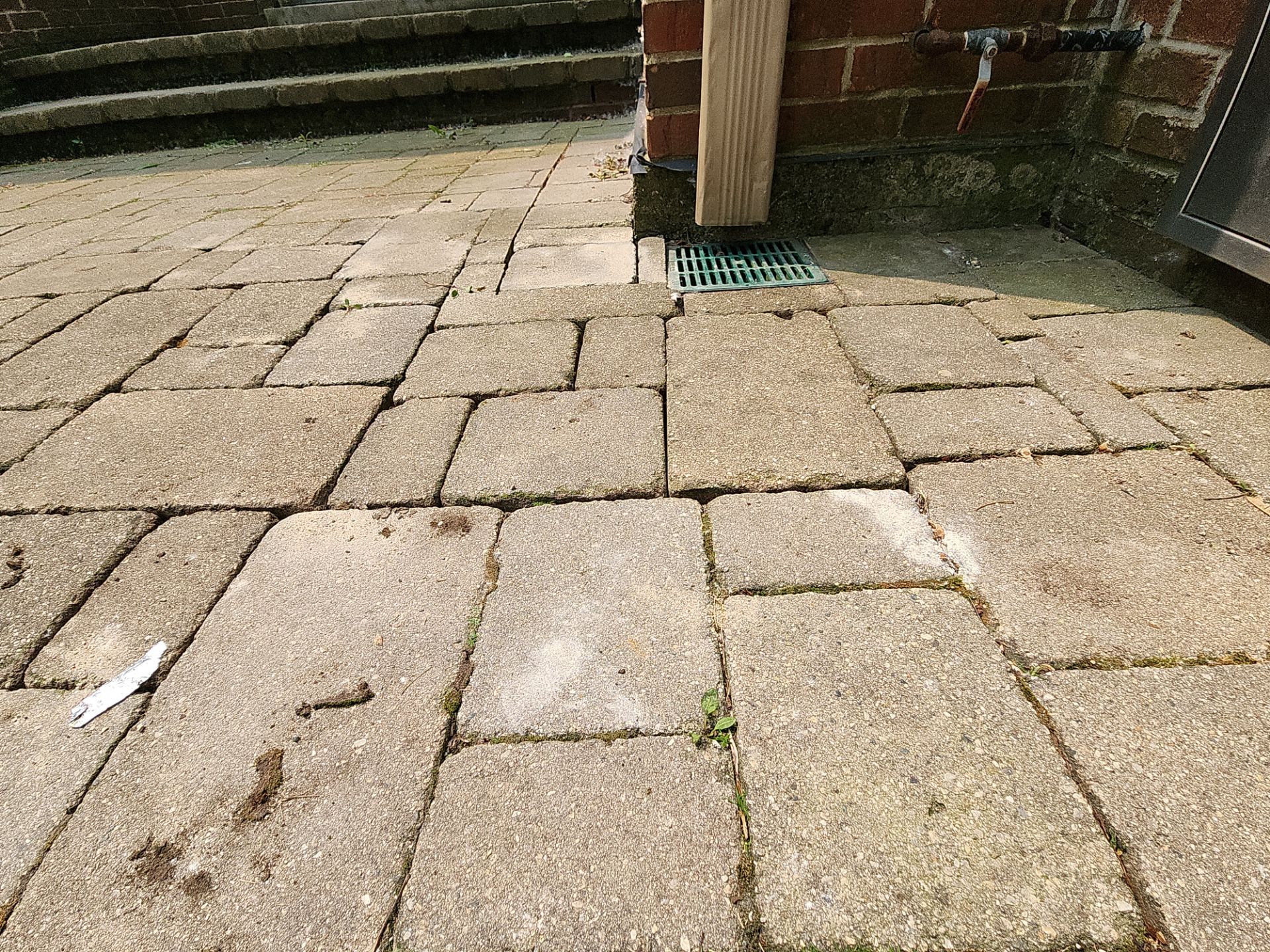 Brick paver repair, clean, seal and poly sanding by Northern Power Washing LLC.