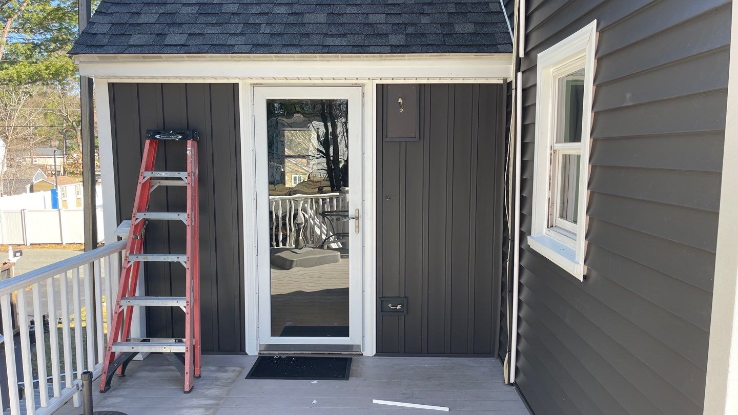 Complete Exterior Renovation with New Siding & Gutters   by Sensible Home Solutions