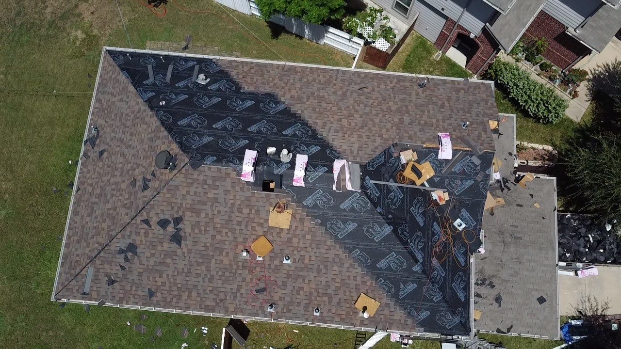 Owens Corning Shingle Roofing Replacement for Houston Two-Story Home by Houston Roofing & Construction