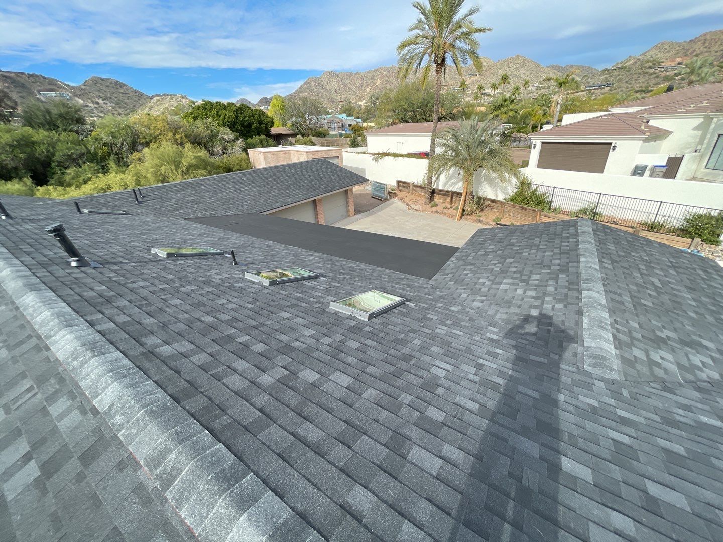 Onyx Black Shingles by Reimagine Roofing