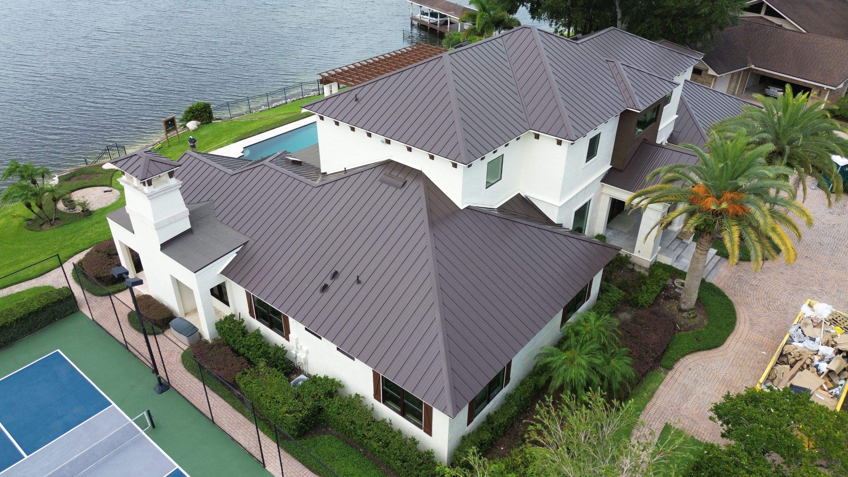 Standing seam metal roof on Lake Conway FL by Gold Key Roofing