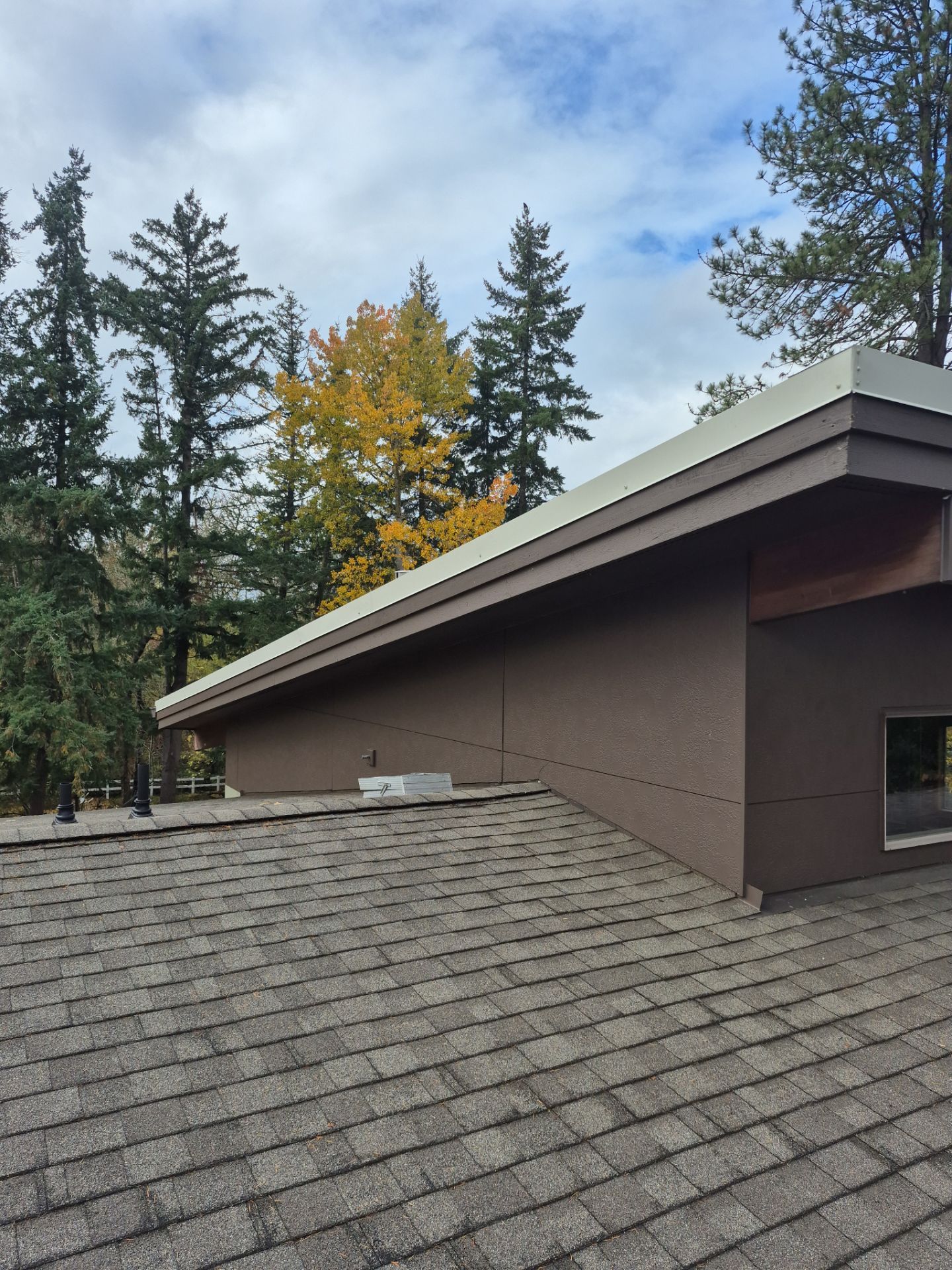 New Metal Roof and replace solar panels by Hawthorne General Construction