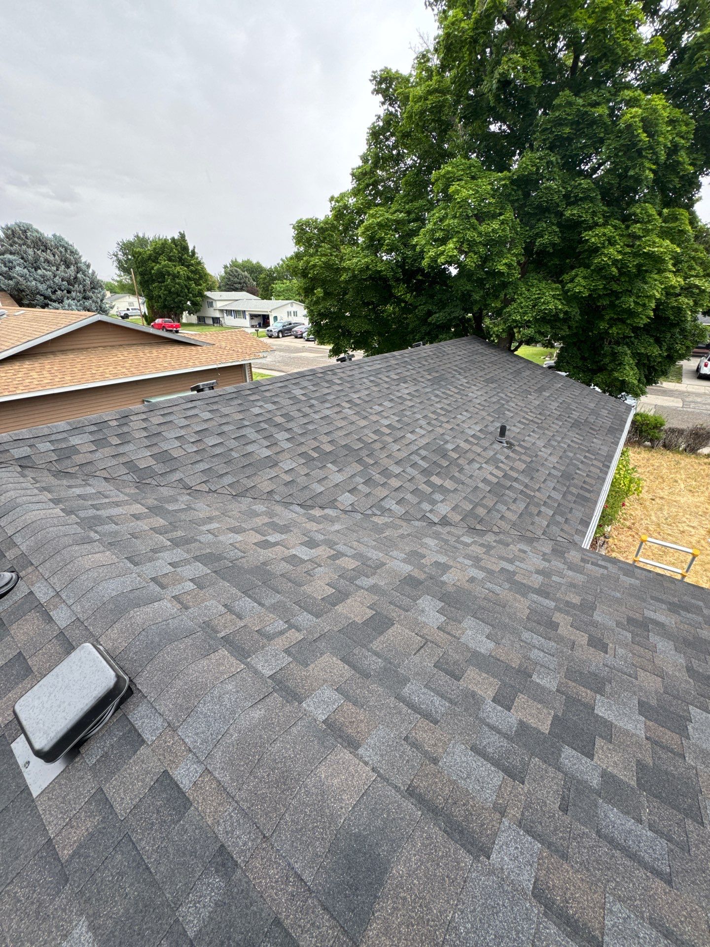 Residential Roof Replacement With Dark Gray Architectural Shingles in Mountain Home by Olive Roofing
