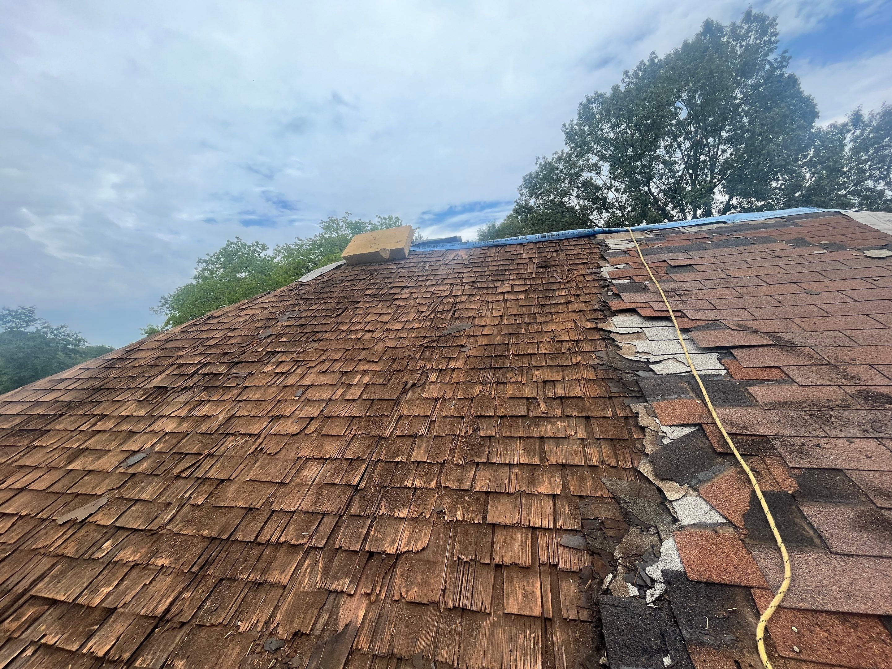 Residential Metal Roof Replacement using Reed's Metals: Colored Residental Panel (Burgundy) by Hostetler Roofing