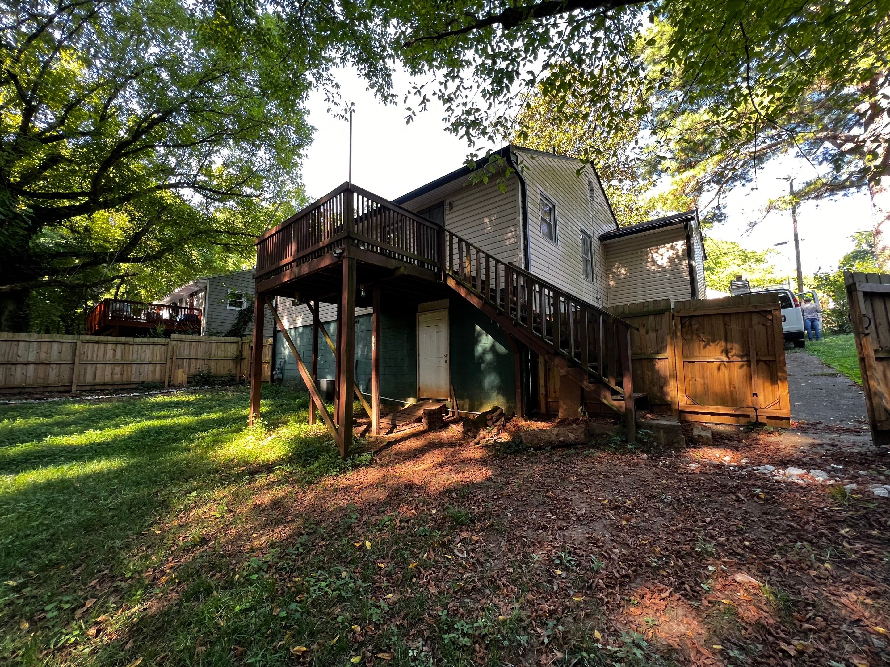 Elevated Pressure-Treated Wood Deck and Staircase Replacement in Atlanta by Swift Home Renovations