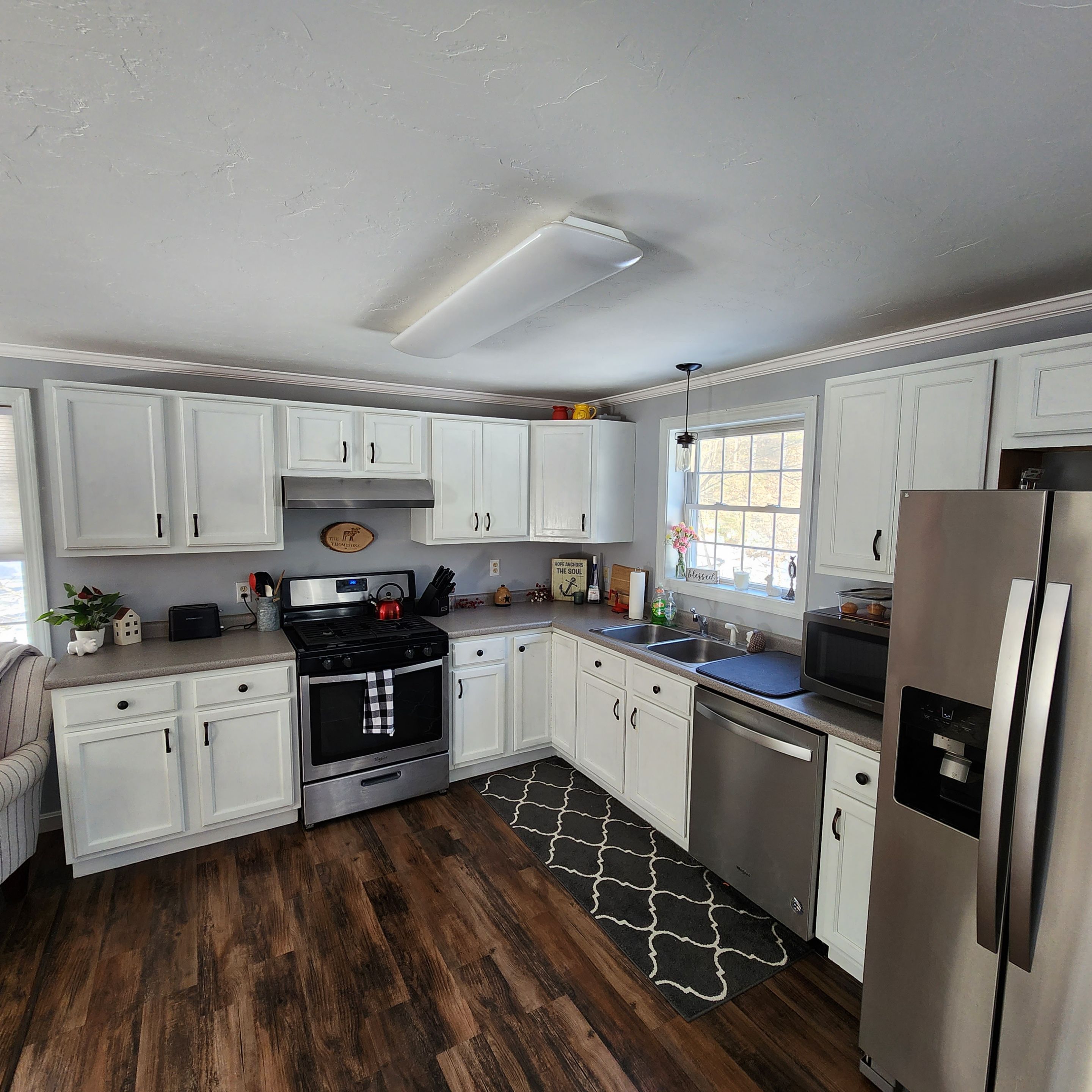 Crown molding installed throughout the first floor in this home. by Freedom Handyman Services
