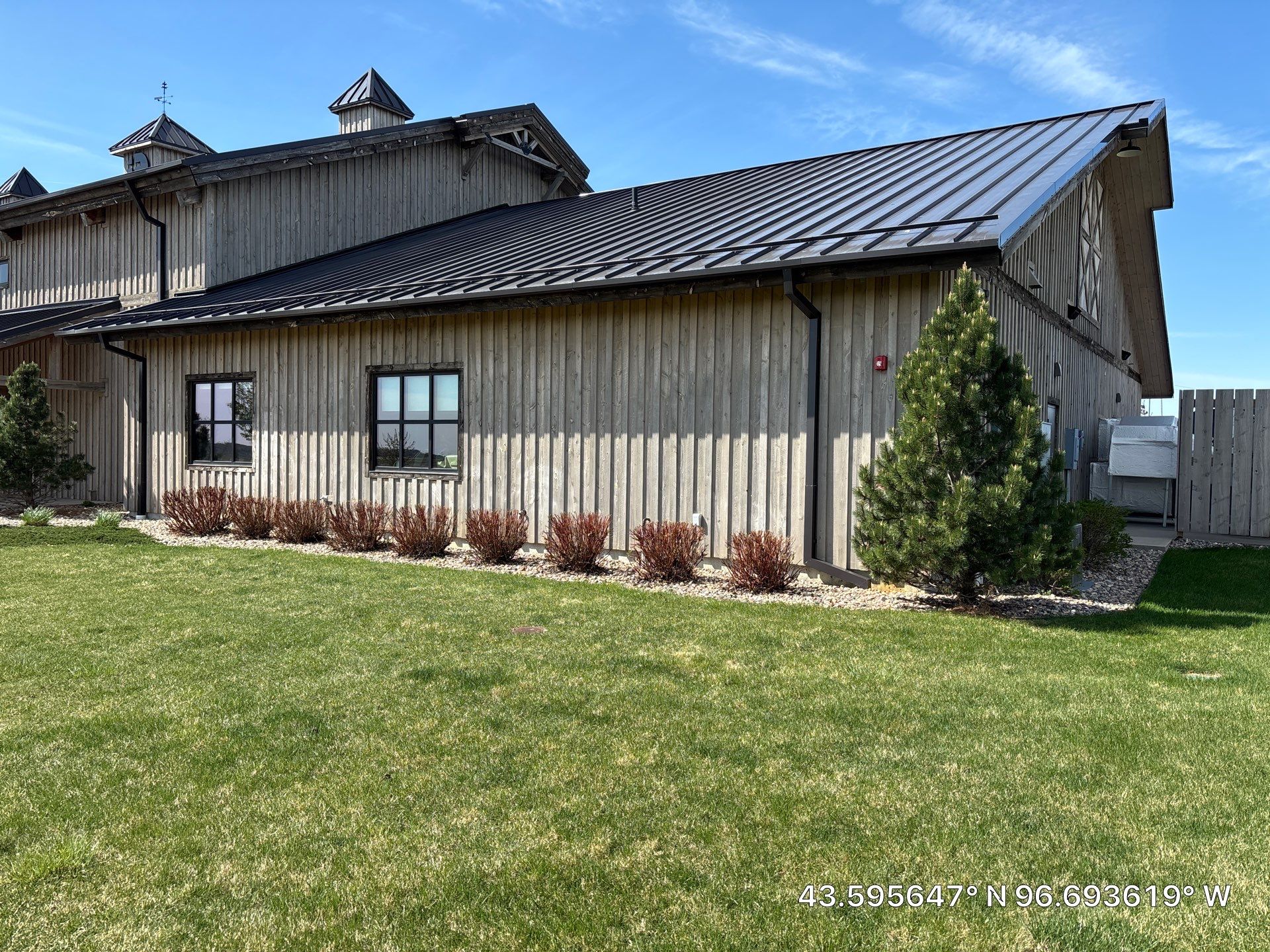 Commercial Exterior Wood Staining for Sanford Barn in Sioux Falls by Select Painting, Coatings & Garage Cabinets