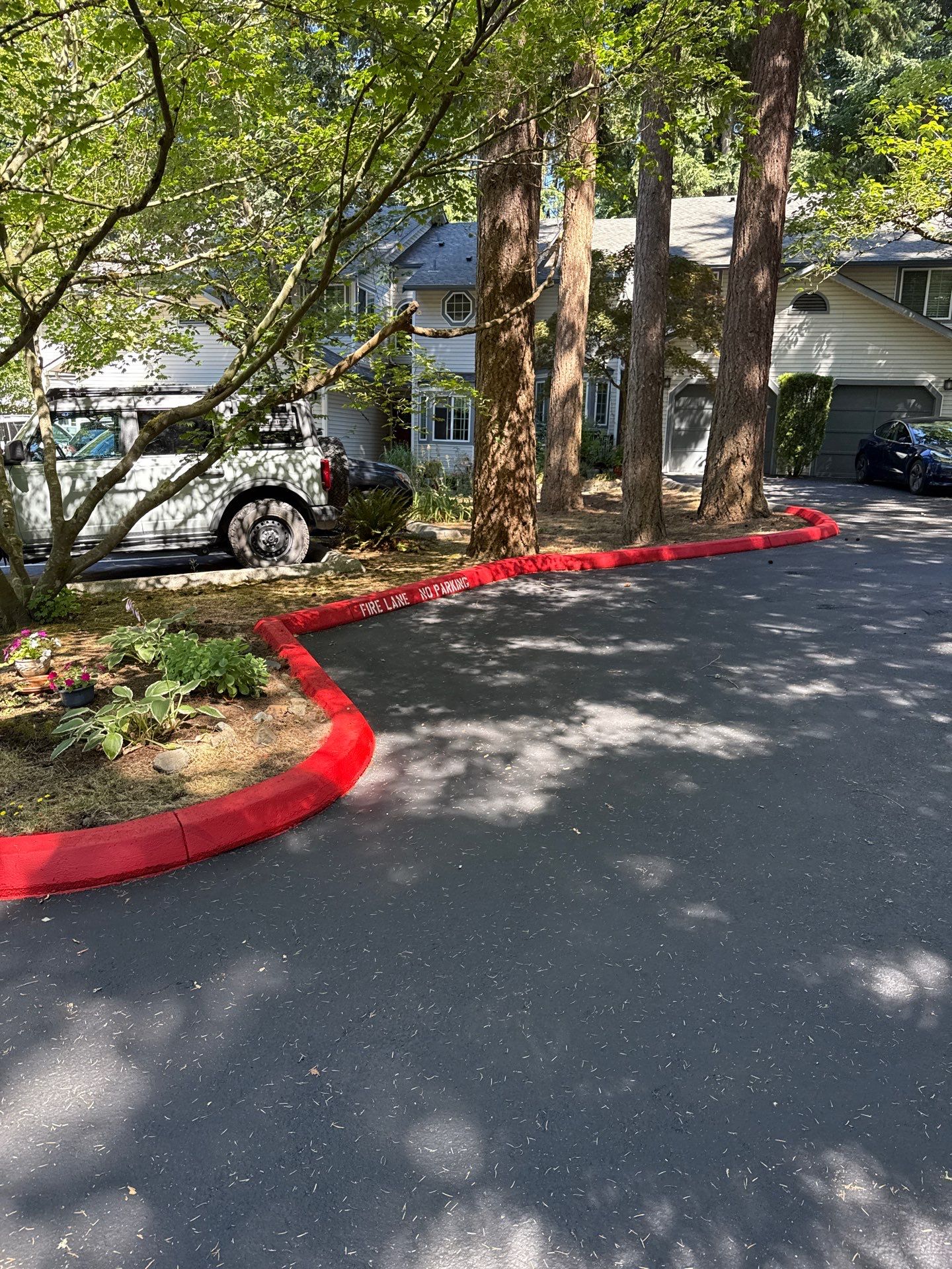 Curb Repaint | Seattle  by Jireh Asphalt & Concrete Inc 