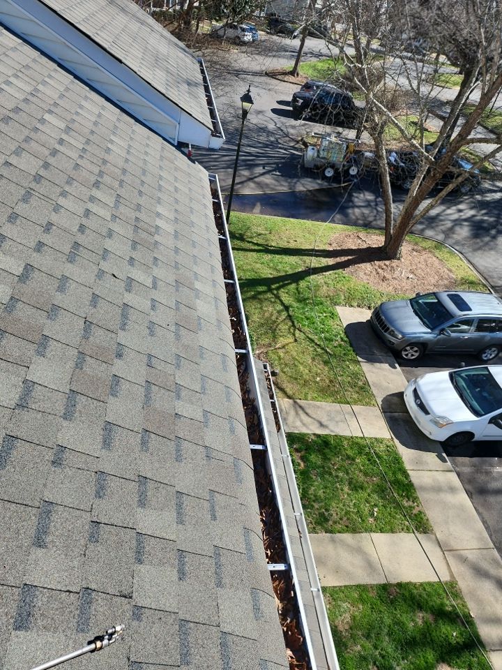 Gutter Cleaning using water by Power Wash Masters LLC