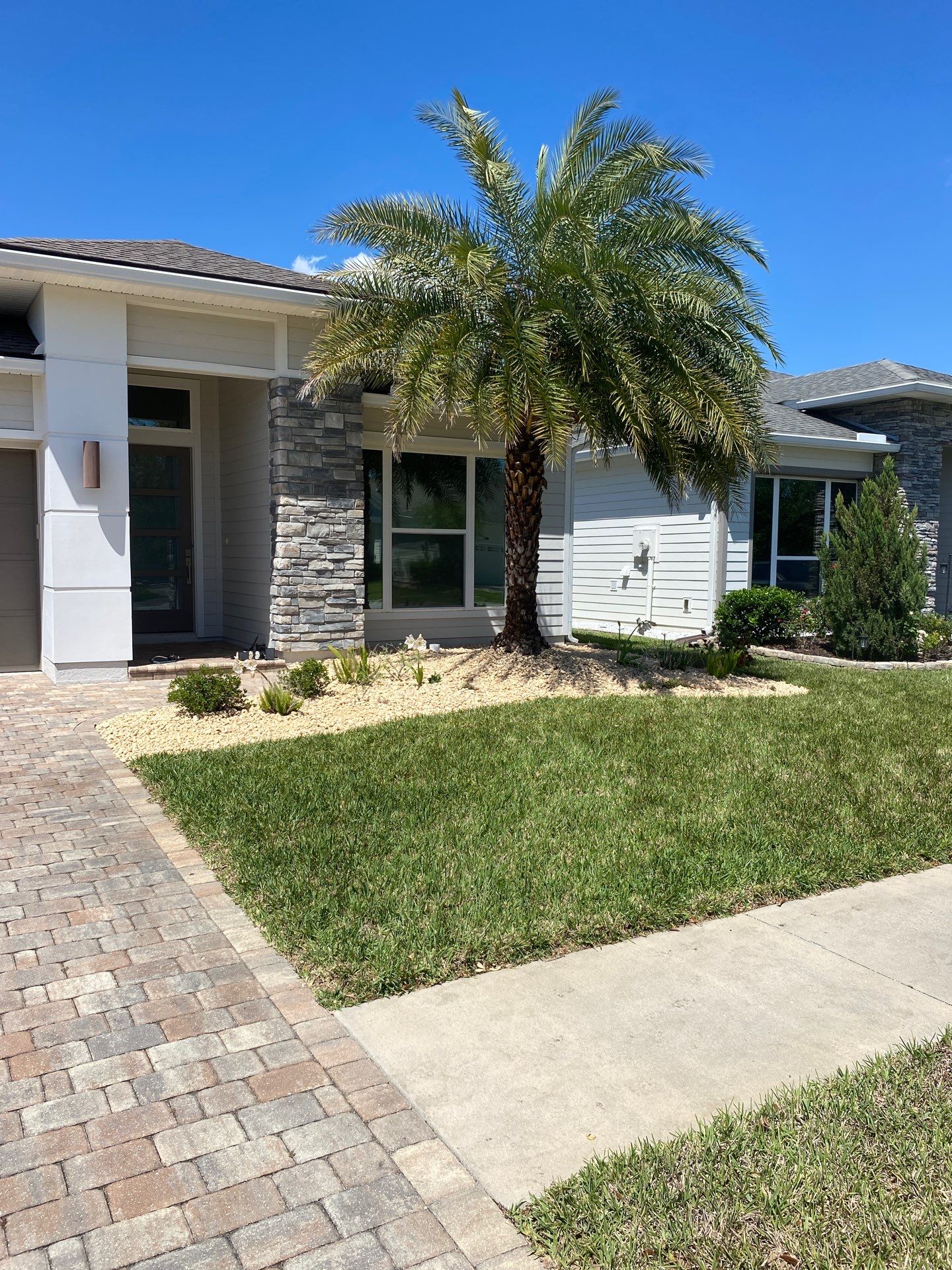 Residential | Clean-up, Sod and Rock Installation by ProGreen Services