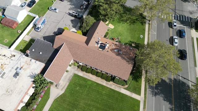 New Covenant Church Roof. by Nisi Home Improvement