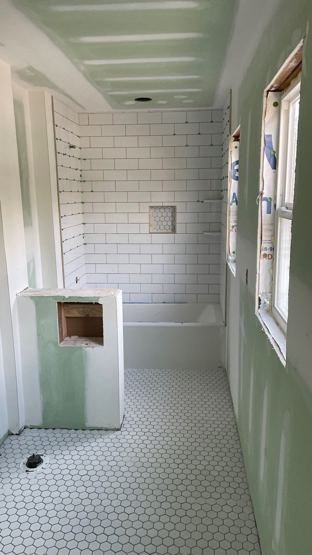 Remodeled Home with new tile floors, Showers and Refinished Oak Floors with stain and Waterbased Finish by Footprints Floors of Coastal Carolina