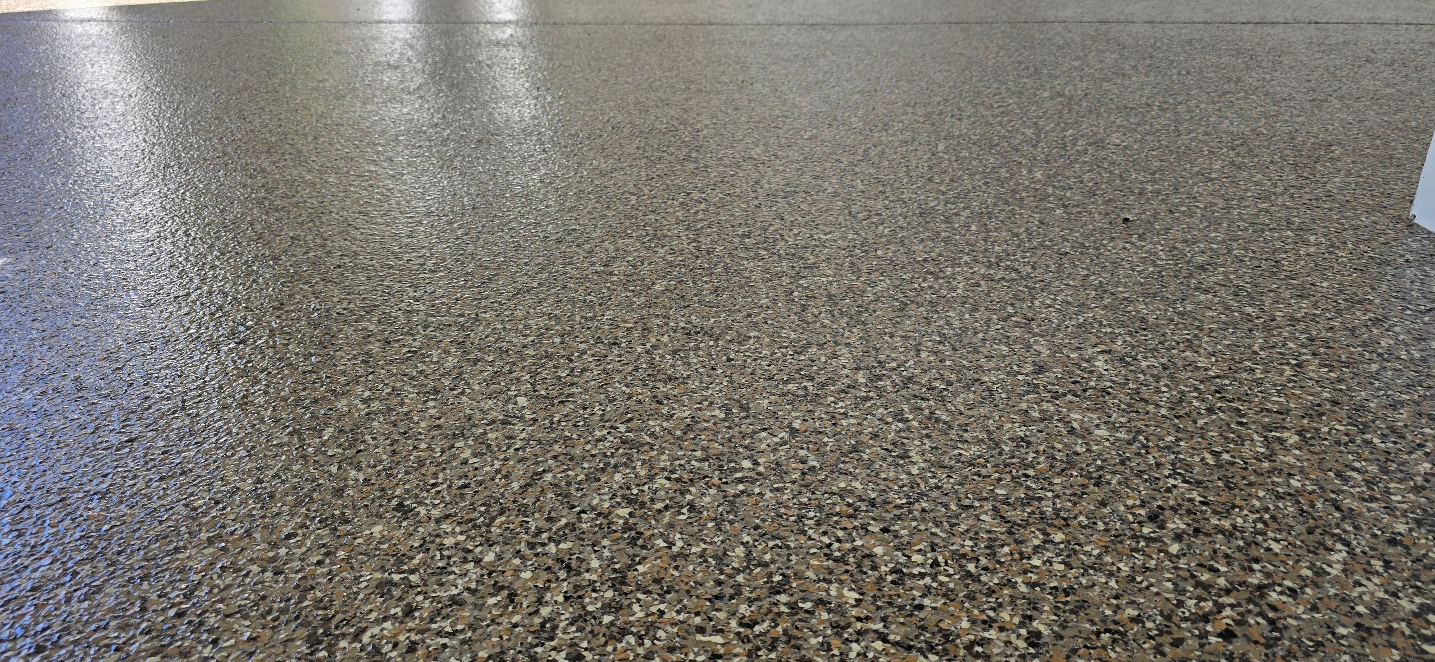 Garage Upgrade Using Custom Creekbed Blend by Elite Floor Solutions