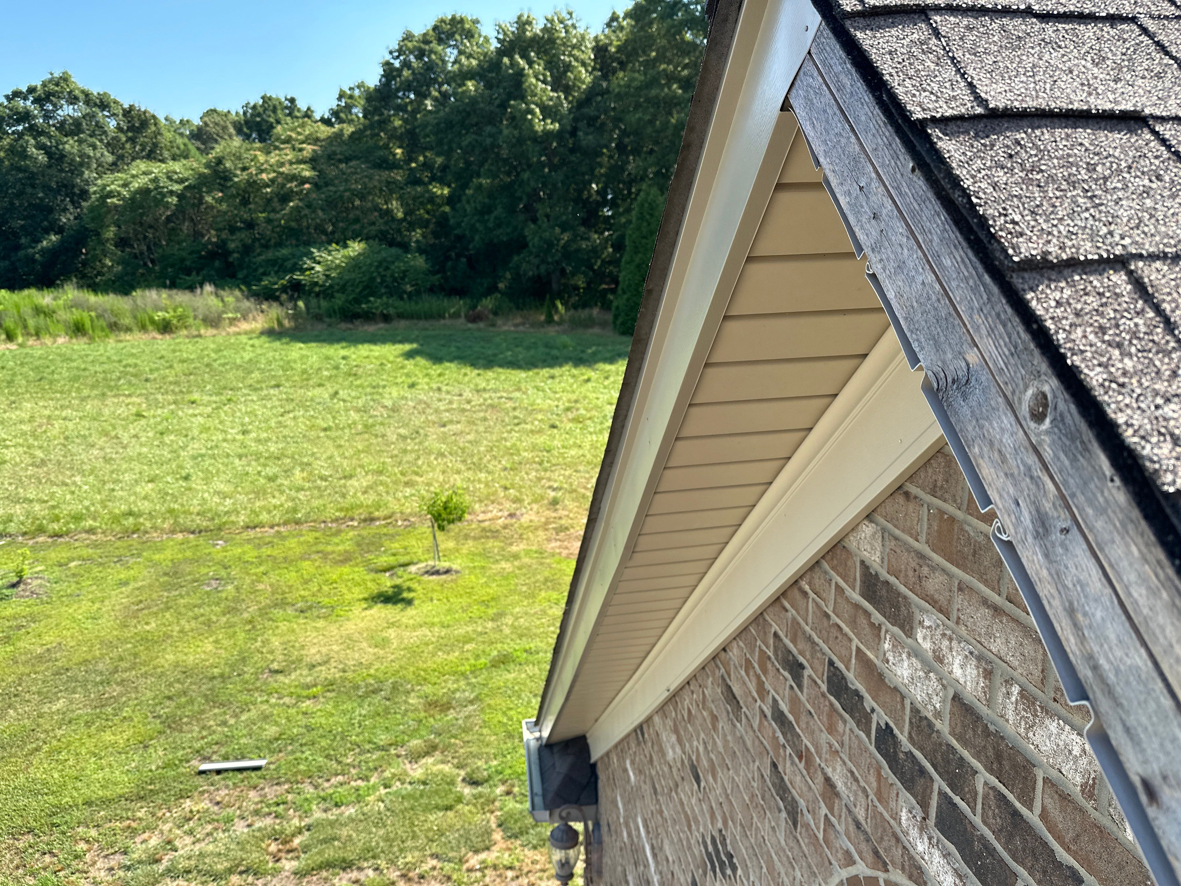 Replacing Wind Damaged Fascia Wrap by New Roof