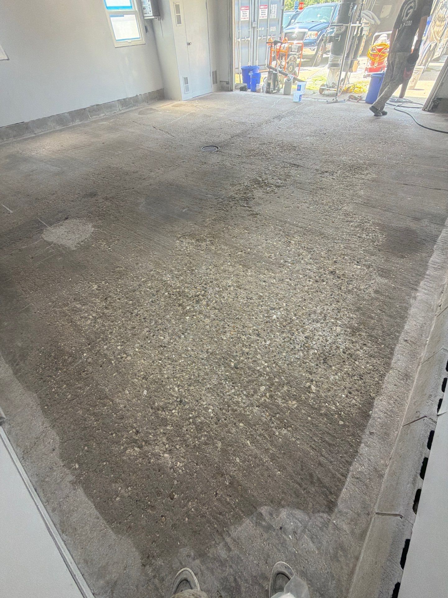 Garage Epoxy Flake Floor Installation and Exterior Siding Repairs in Muskegon by Gordon Painting