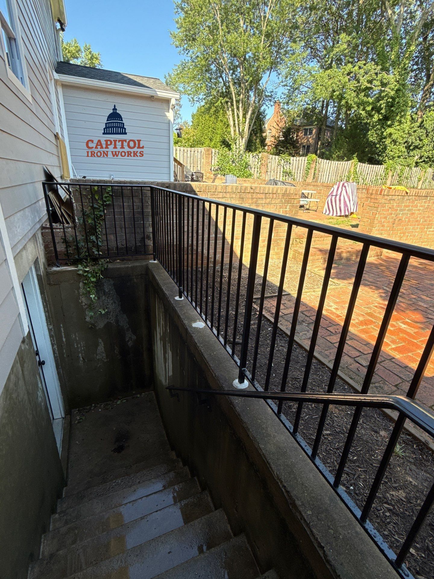 L-Shape Iron Railing & Integrated Safety Gate – Residential Exterior– McLean, VA by Capitol Iron Works