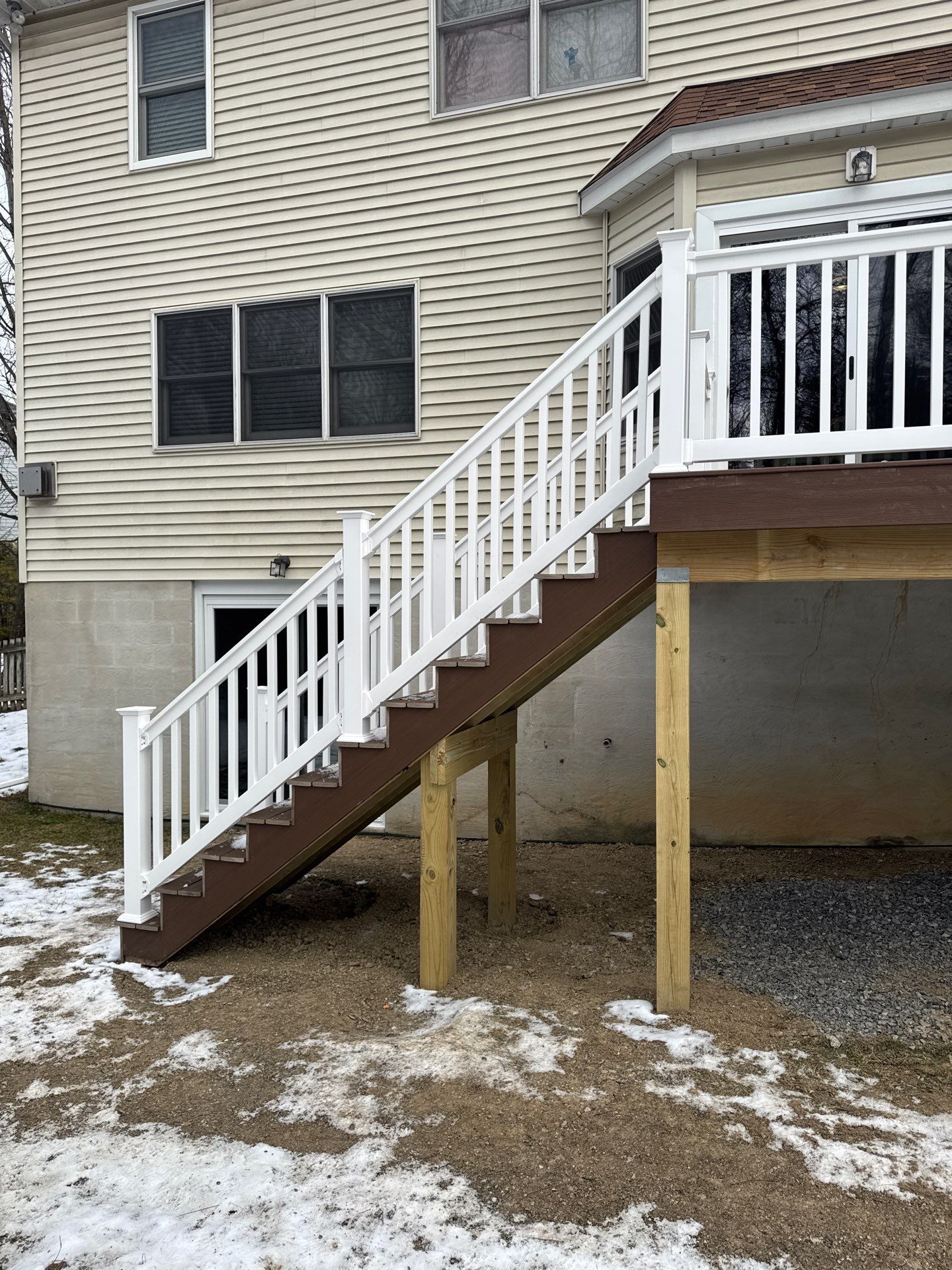 Patio door replacement and deck upgrade by Esh Builders