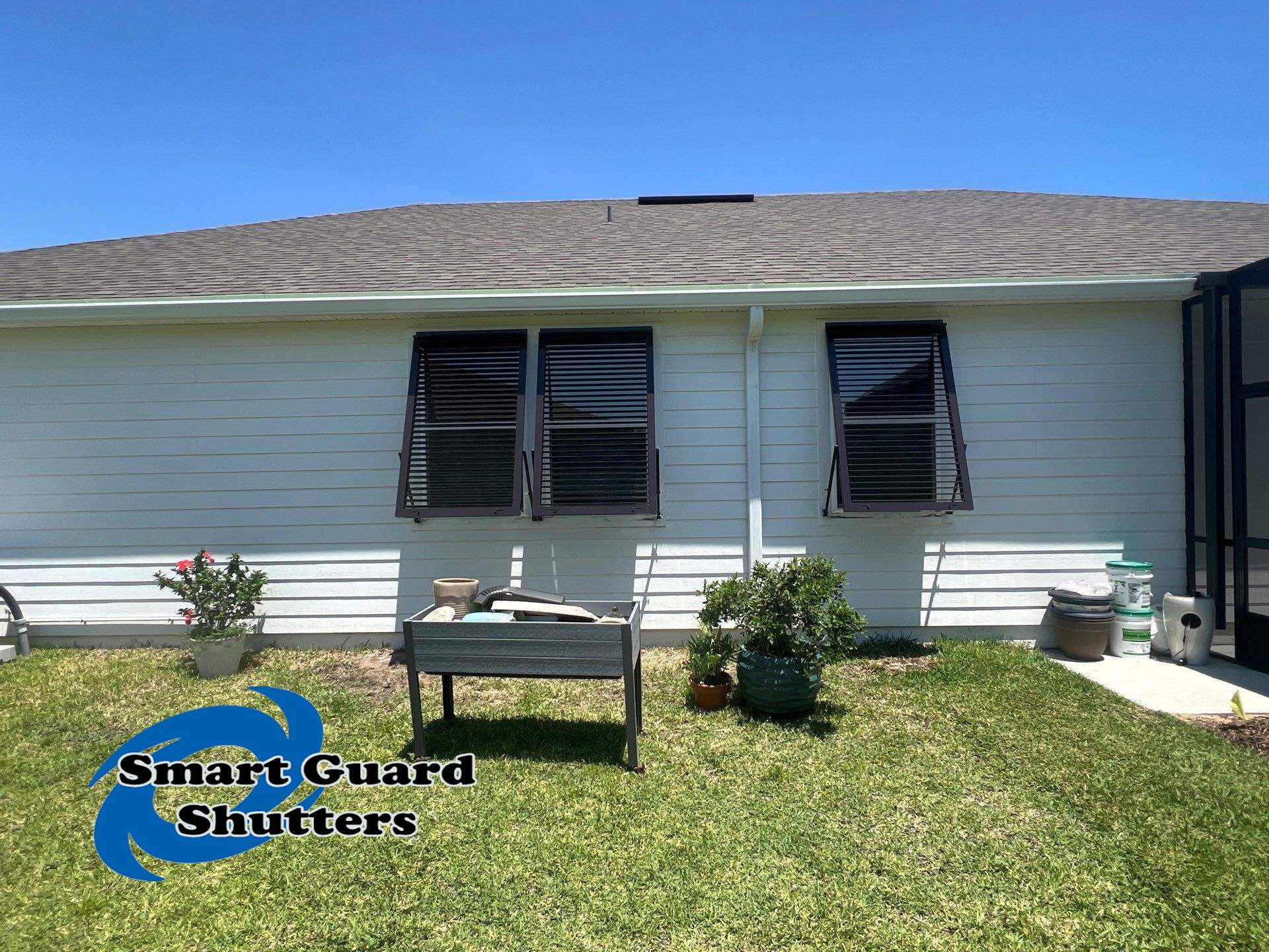 Impact Bahamas In Grey Brown by Smart Guard Shutters
