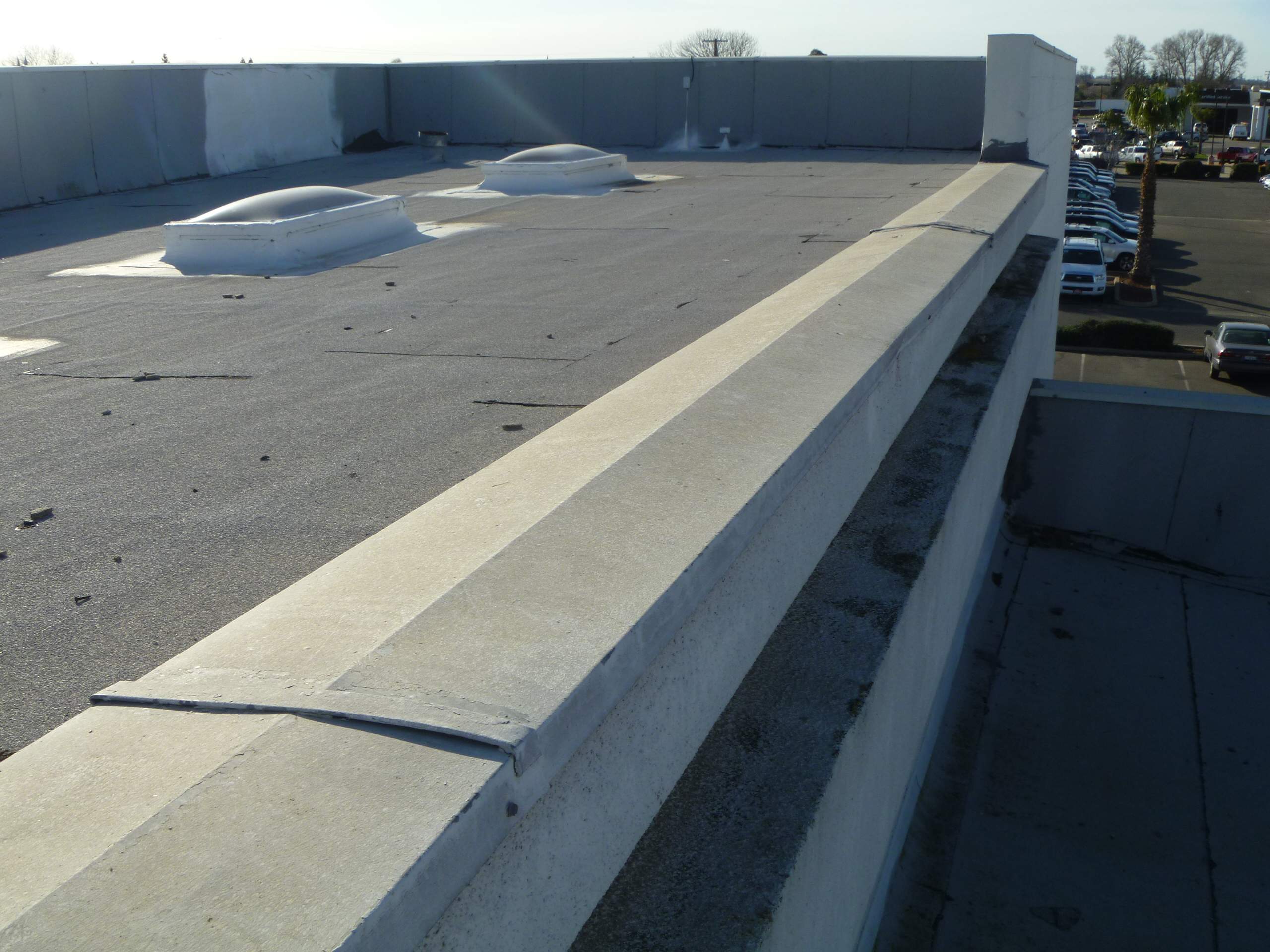 Commercial Roofing Installation using Spray foam and Conklin Benchmark/PUMA XL 18 yr warranty coatings by Straight Edge Roofing Inc