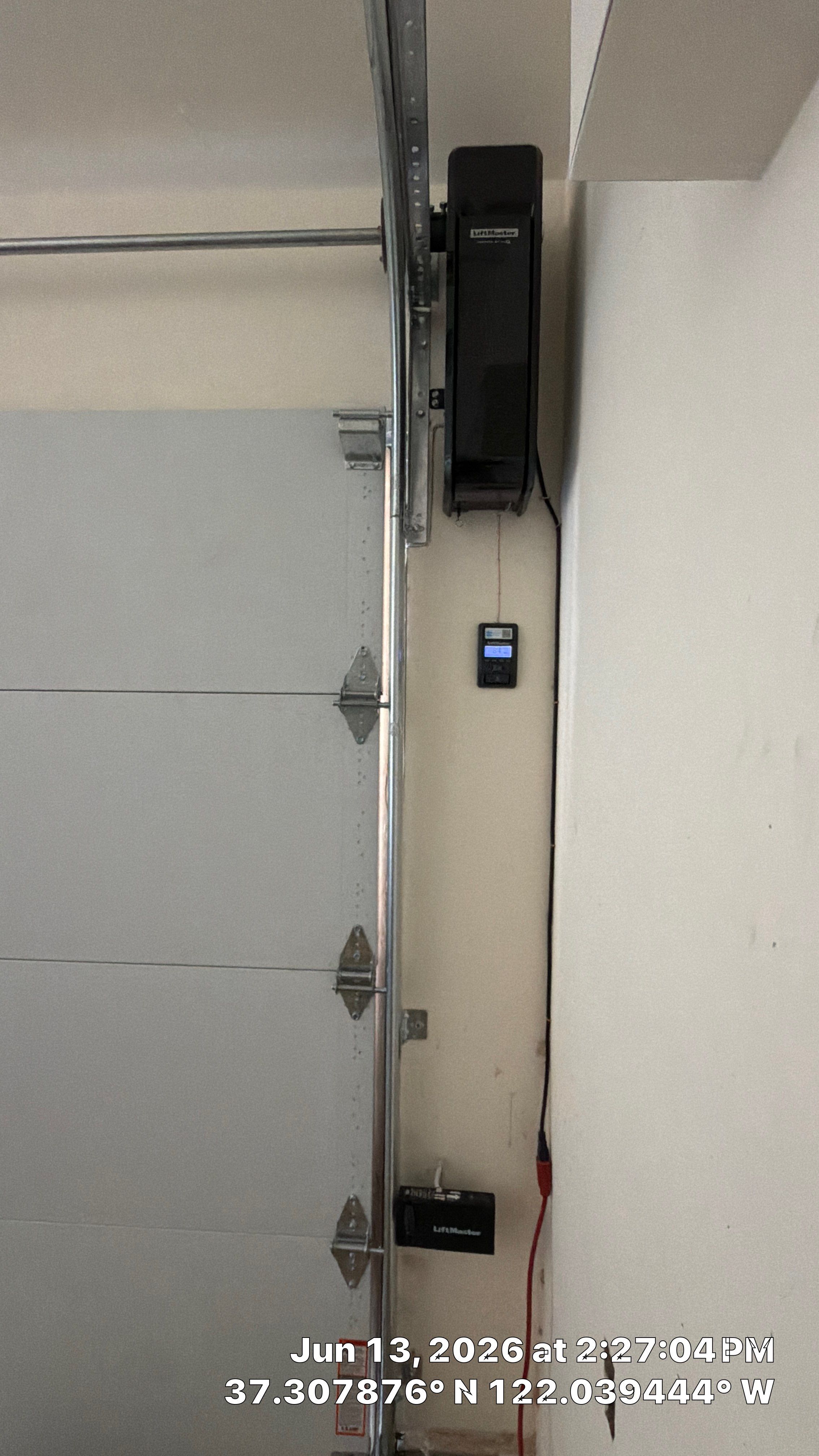 Modern Black Garage Door Installation With Vertical Windows In Cupertino by Valiant Garage Door
