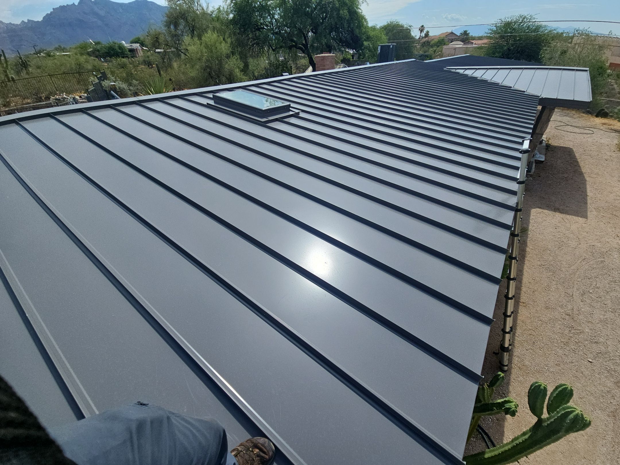 Charcoal Gray Standing Seam by Reimagine Roofing