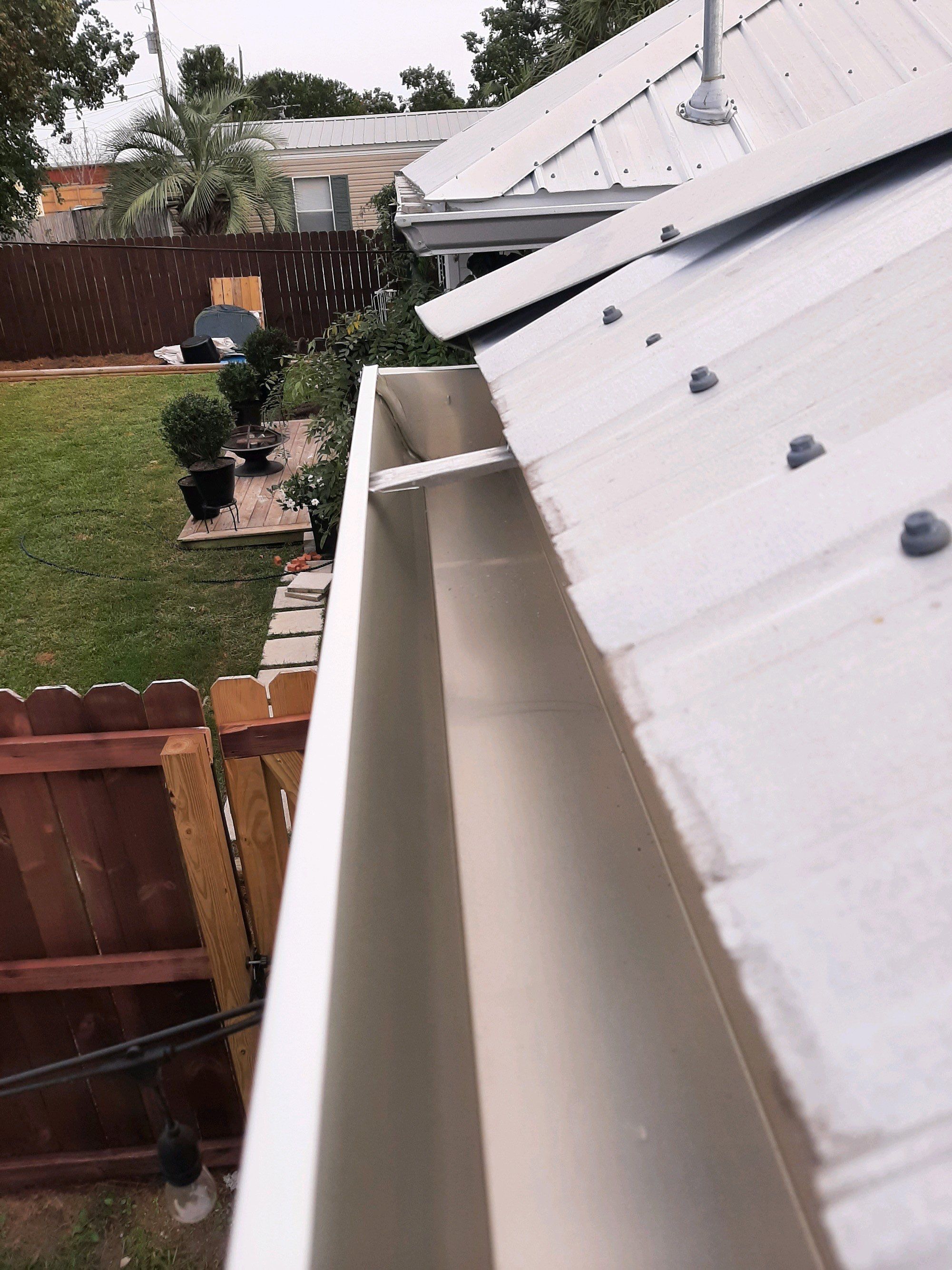 Seamless Gutter Installation using White K-Style Gutters by Gutter Professors