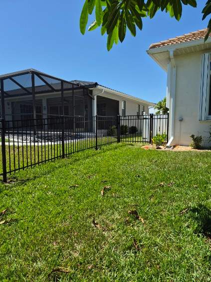 Custom Black Aluminum Fence Enclosure for Punta Gorda Waterfront Property by True Fence LLC