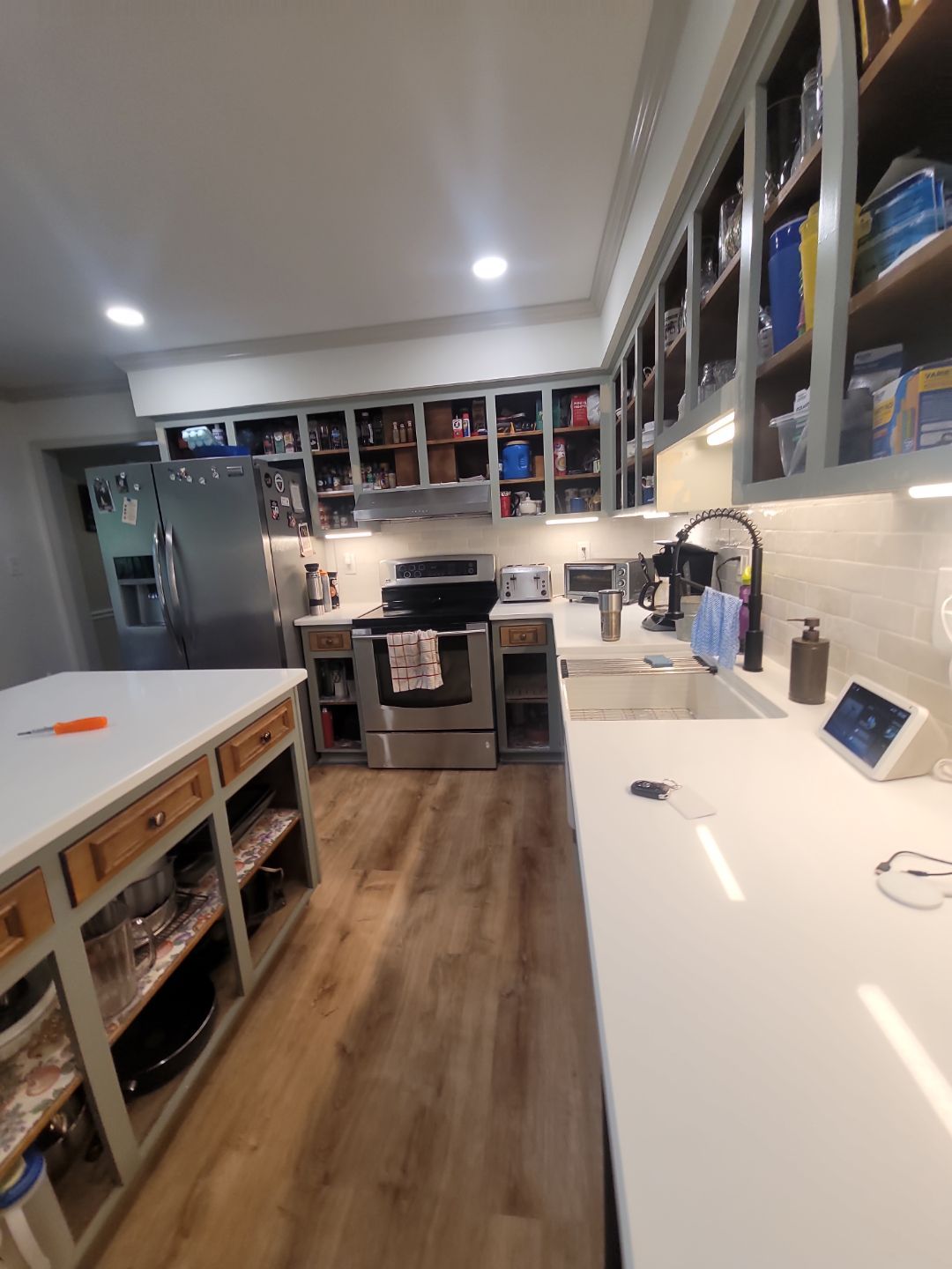 A Pathway to Personality – A Two-Tone Kitchen Transformation in Apex by Elite Remodeling and Design LLC