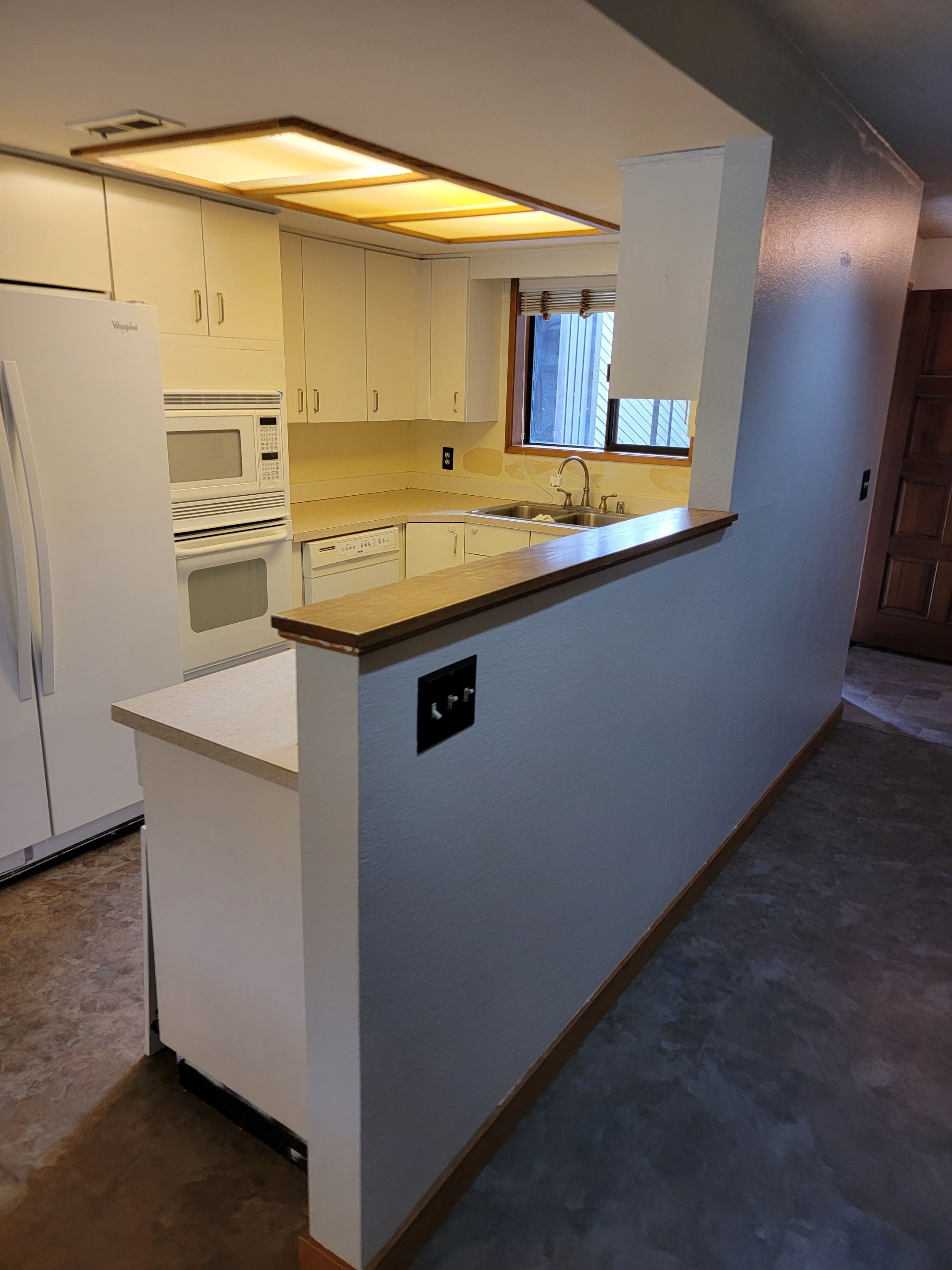 outdated Kitchen to a modern and simplistic kitchen area by Crm Services Llc