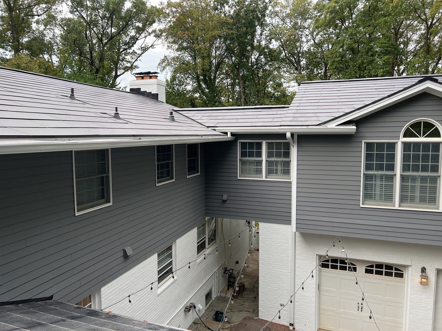 Tesla Solar Roof Replacement using Tesla Solar Roof V3 Tiles by American Home Contractors