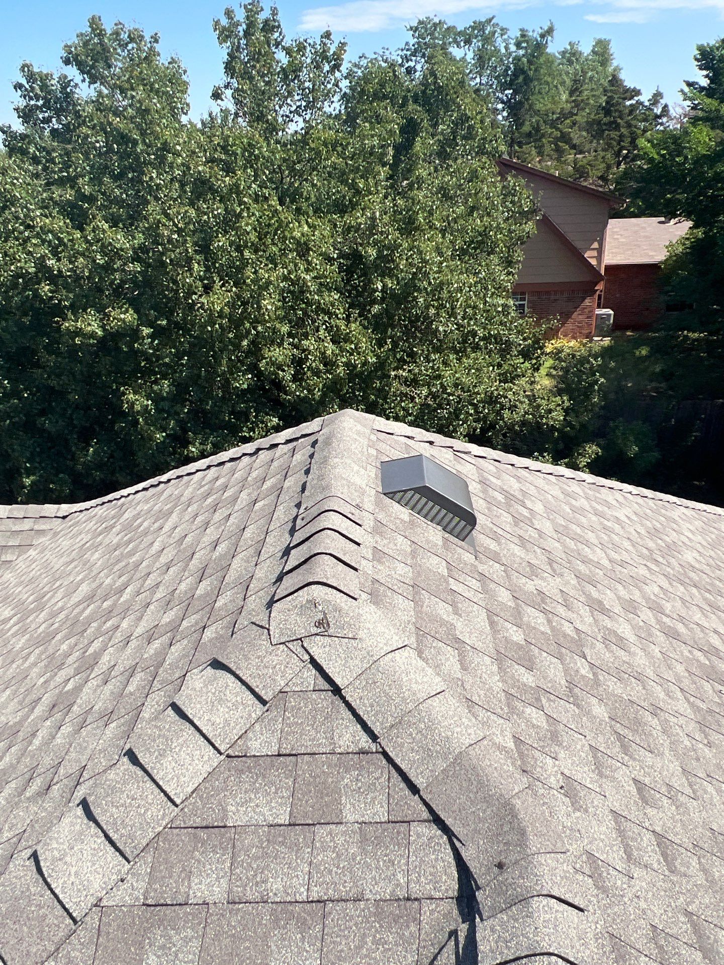 Roof Replacement and Gutter Installation in Edmond, OK by McCann's Roofing and Construction