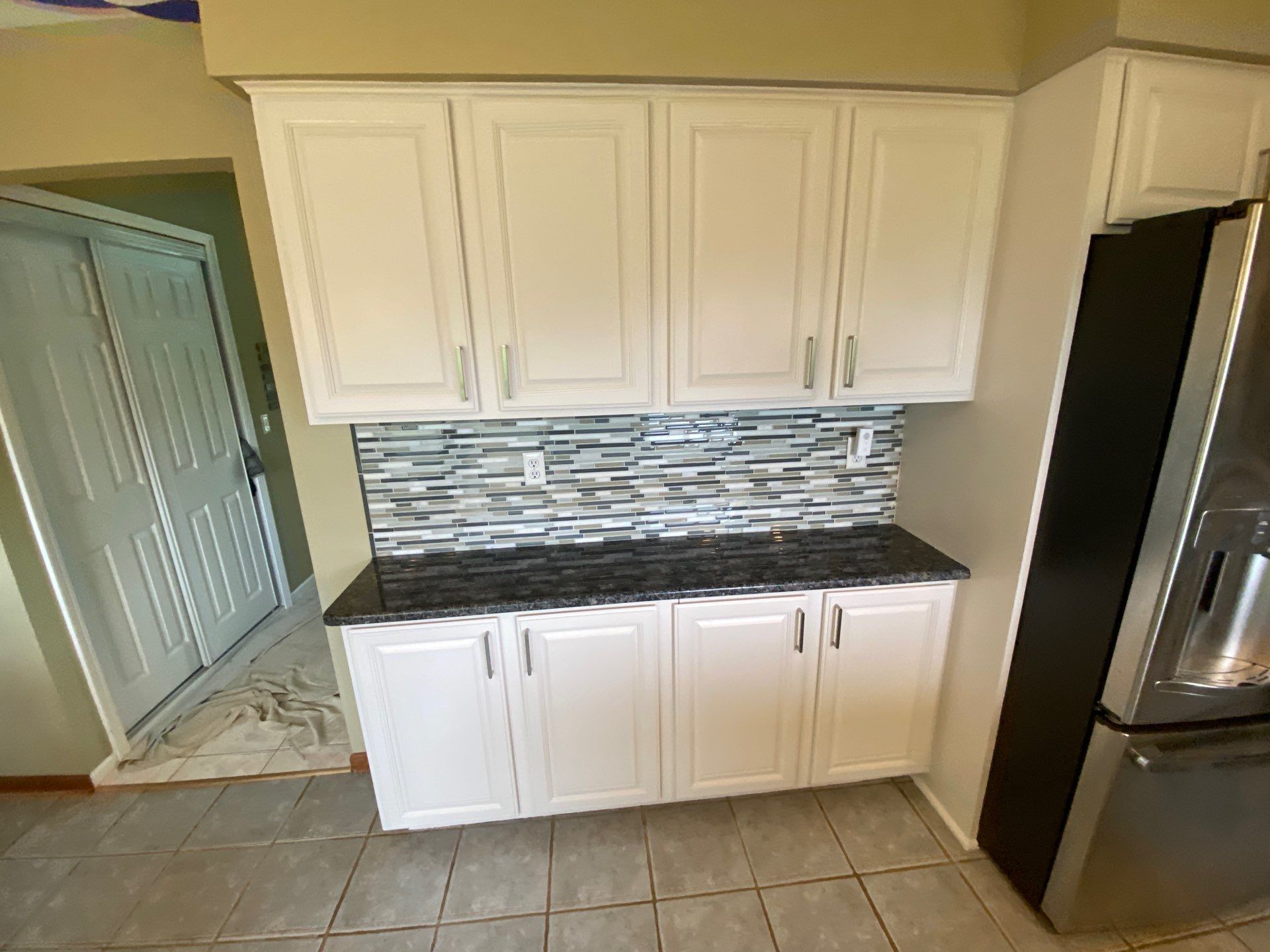 Kitchen Cabinet Refinishing and Hardware Upgrade in White Lake by Top Shelf Painter