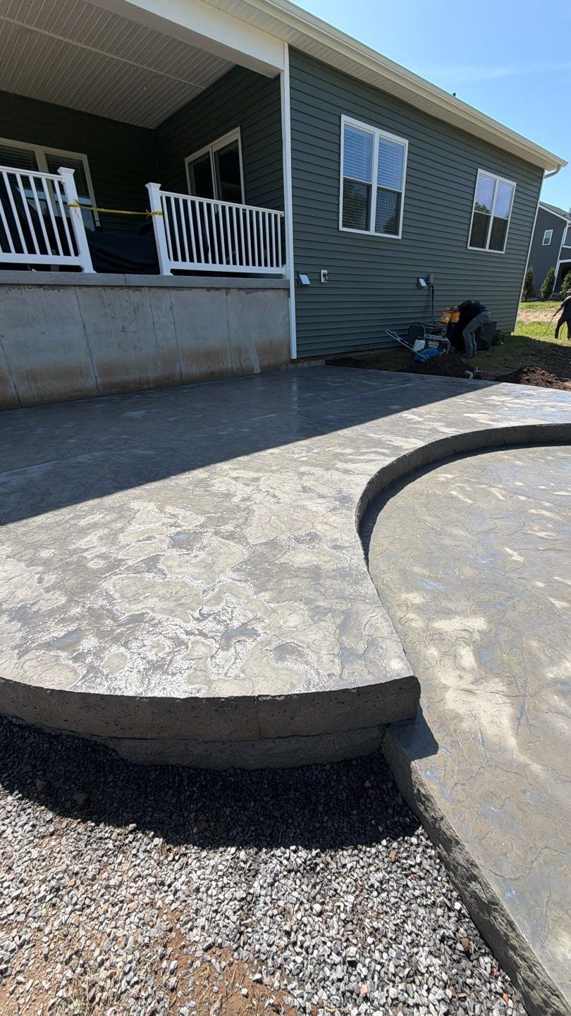 Oxford Slate Patio with Fire Pit by NG Masonry & Construction LLC