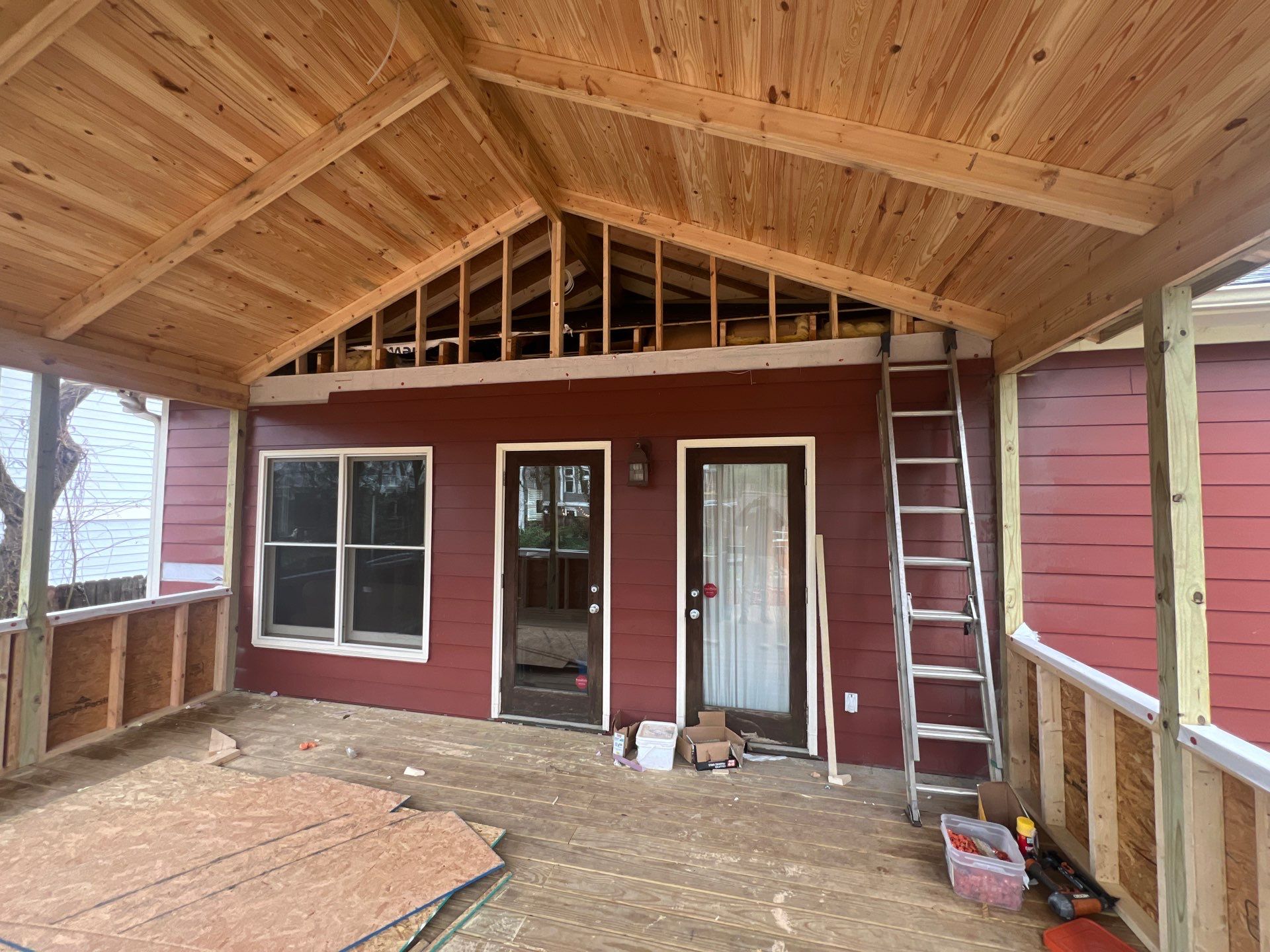 Elevated Screened-In Porch Addition with Vaulted Tongue-and-Groove Ceiling by Swift Home Renovations