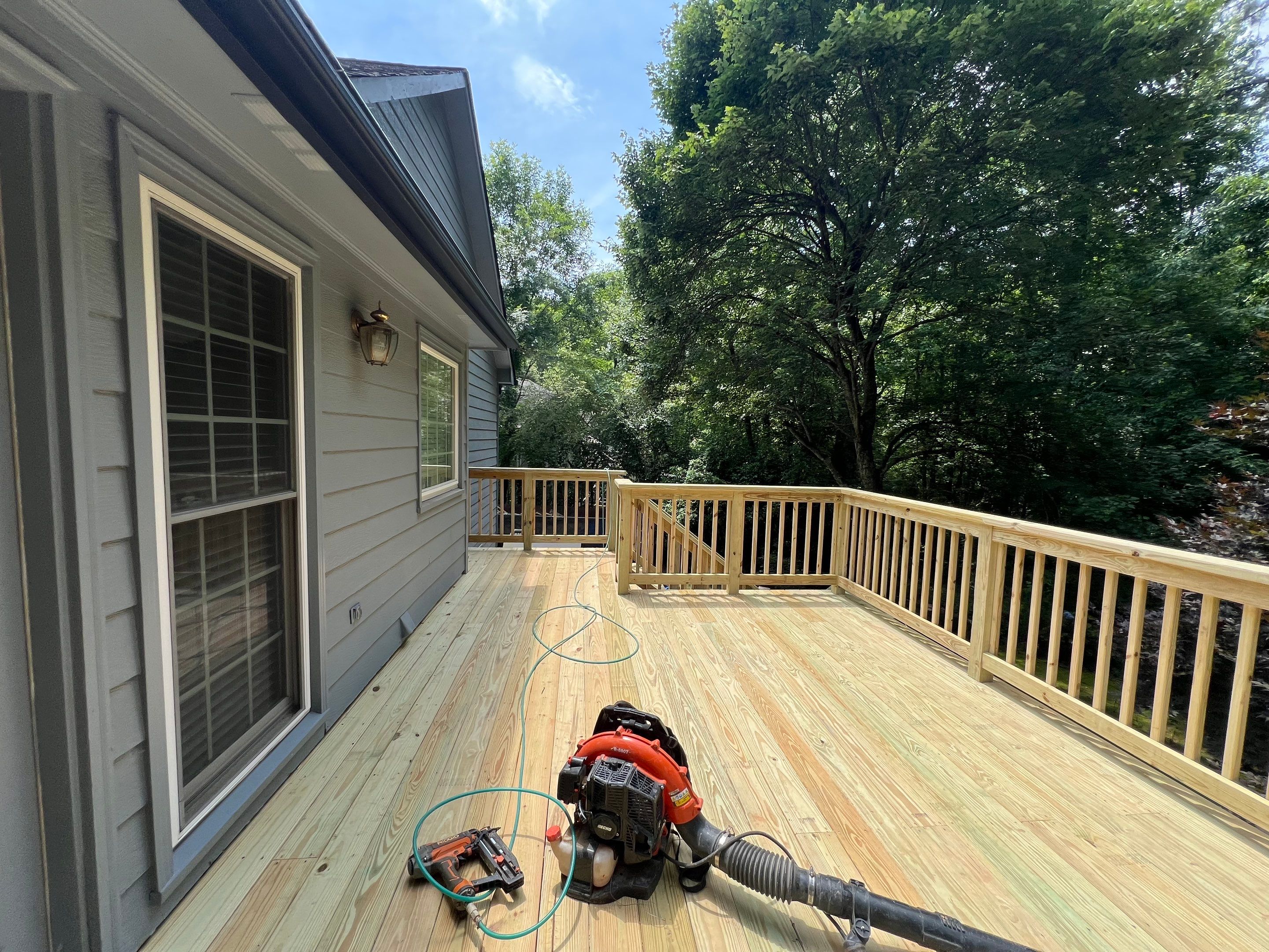 Pressure-Treated Wood Deck Replacement and Staircase Installation in Kennesaw by Swift Home Renovations