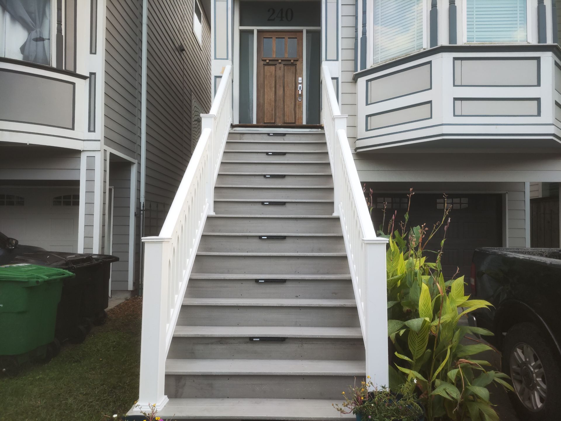 Timbertech Staircase with a 50 year warranty and solar lighting by Majesty Construction