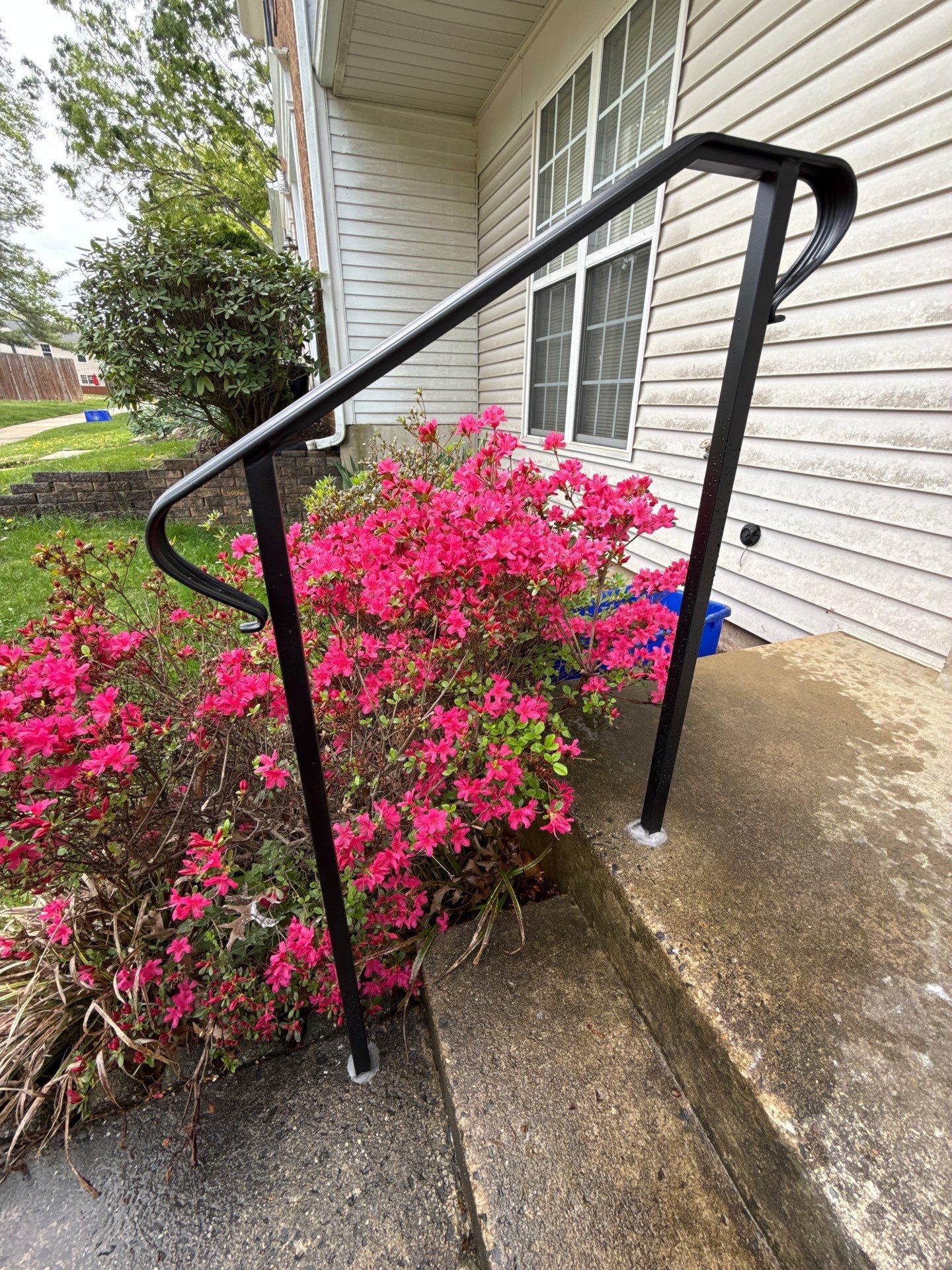Custom Black Metal Exterior Handrail Installation in Olney by Capitol Iron Works
