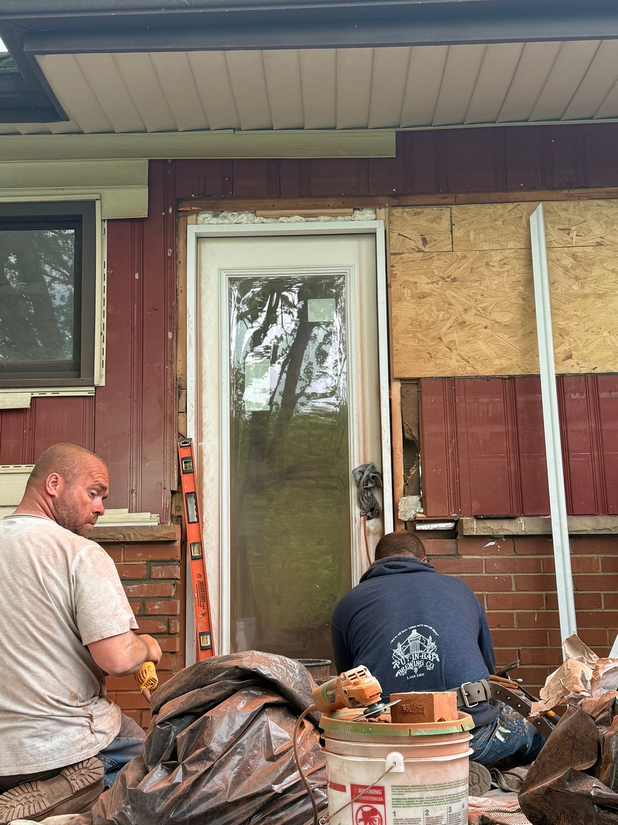 Deck and door install by Cousins Roofing Siding & Decks