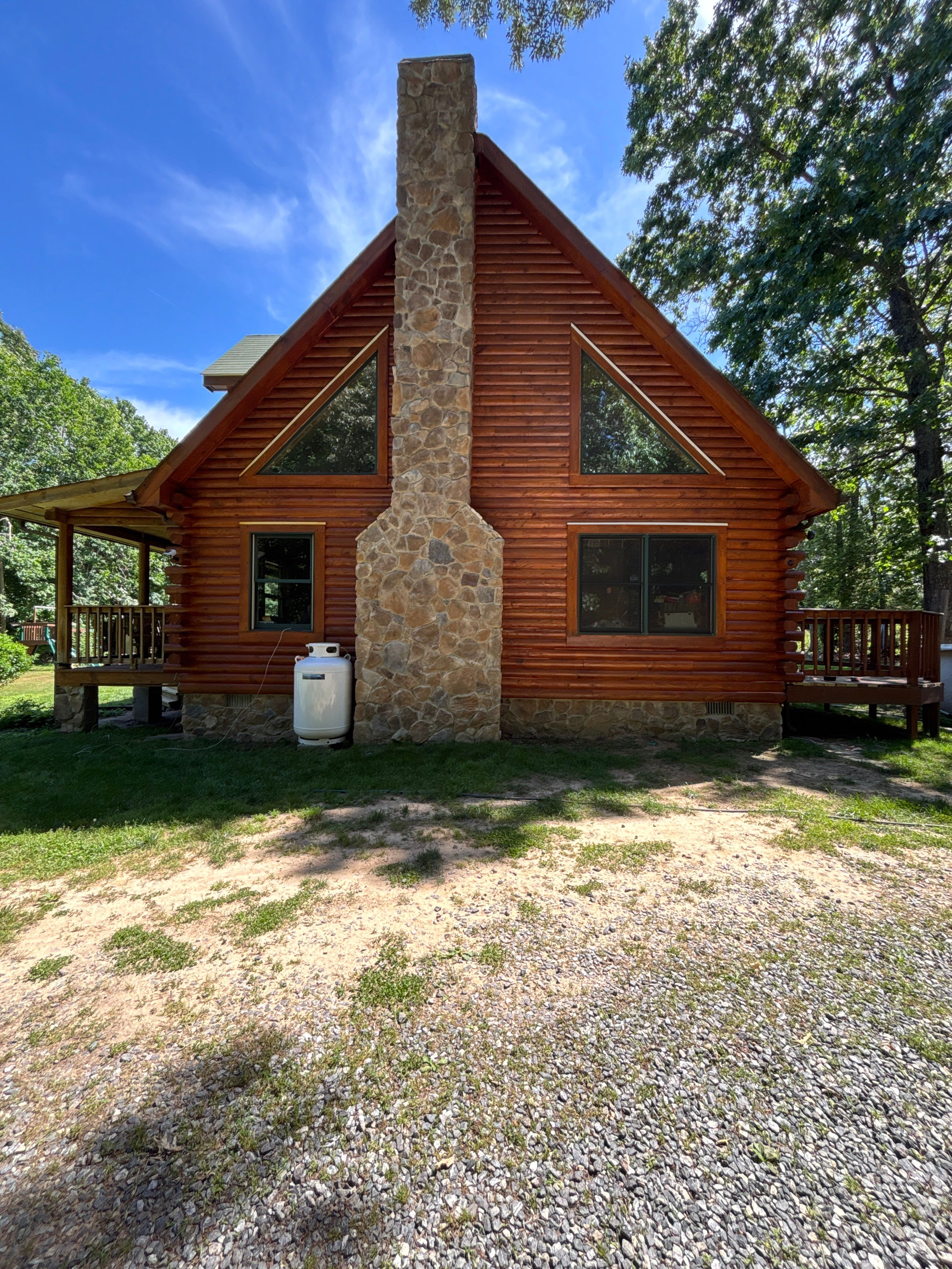 Jay's Log Cabin Re-Stain by Highfill Painting
