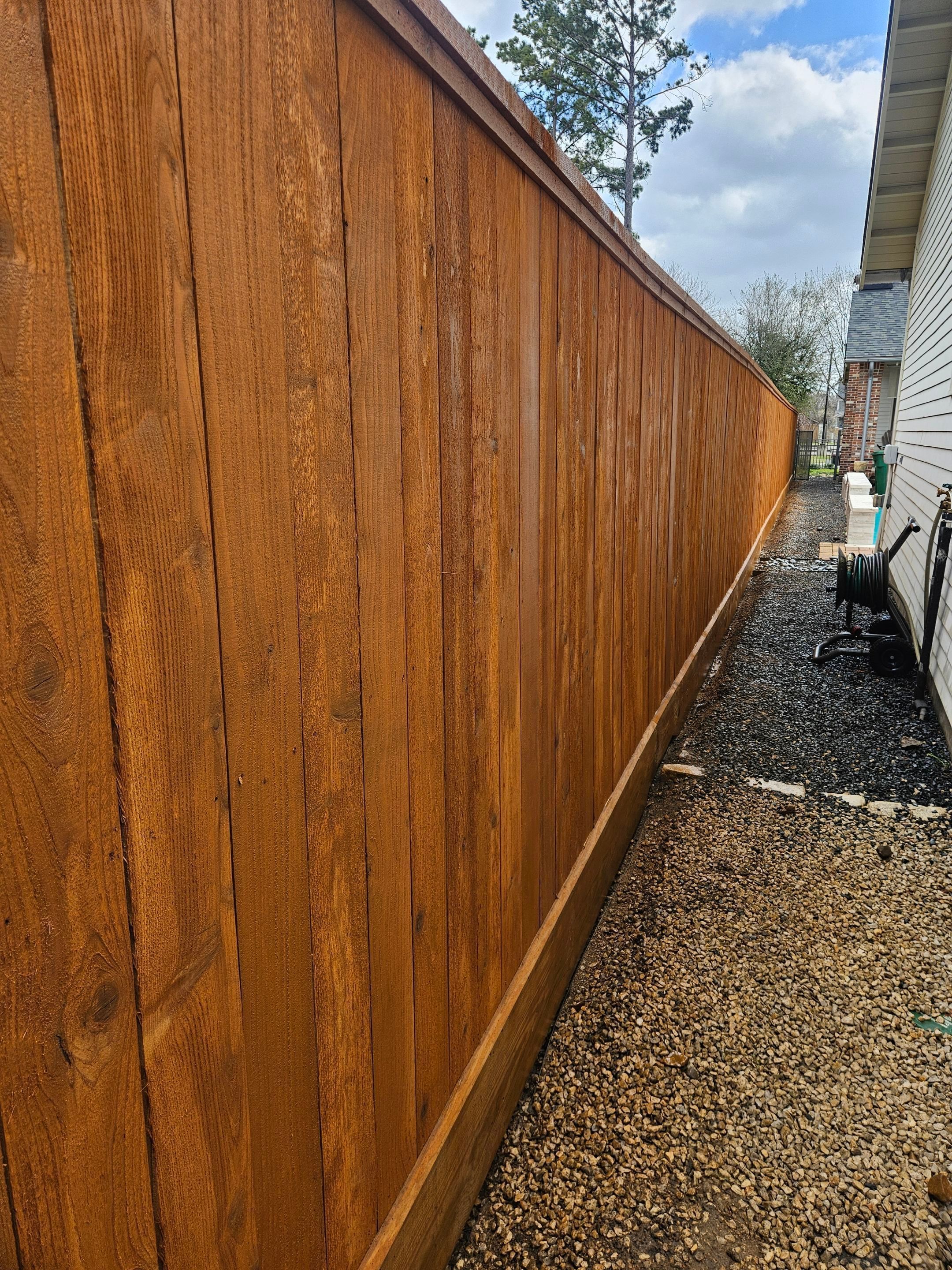 Durable Fence & Gate Installation with Premium Stain by Tim's Fences