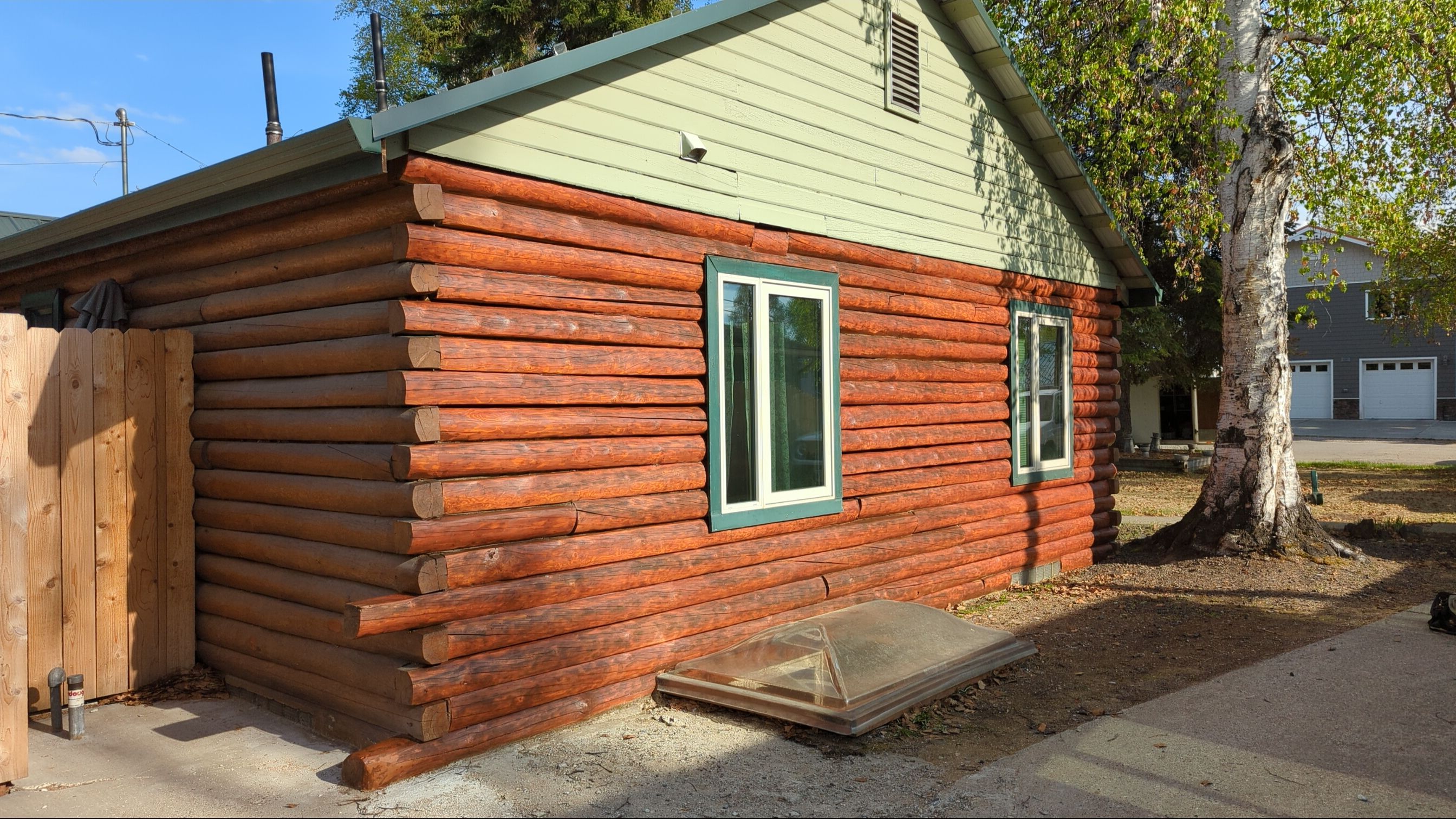 Log Home Exterior Staining by Midnight Sun Painting