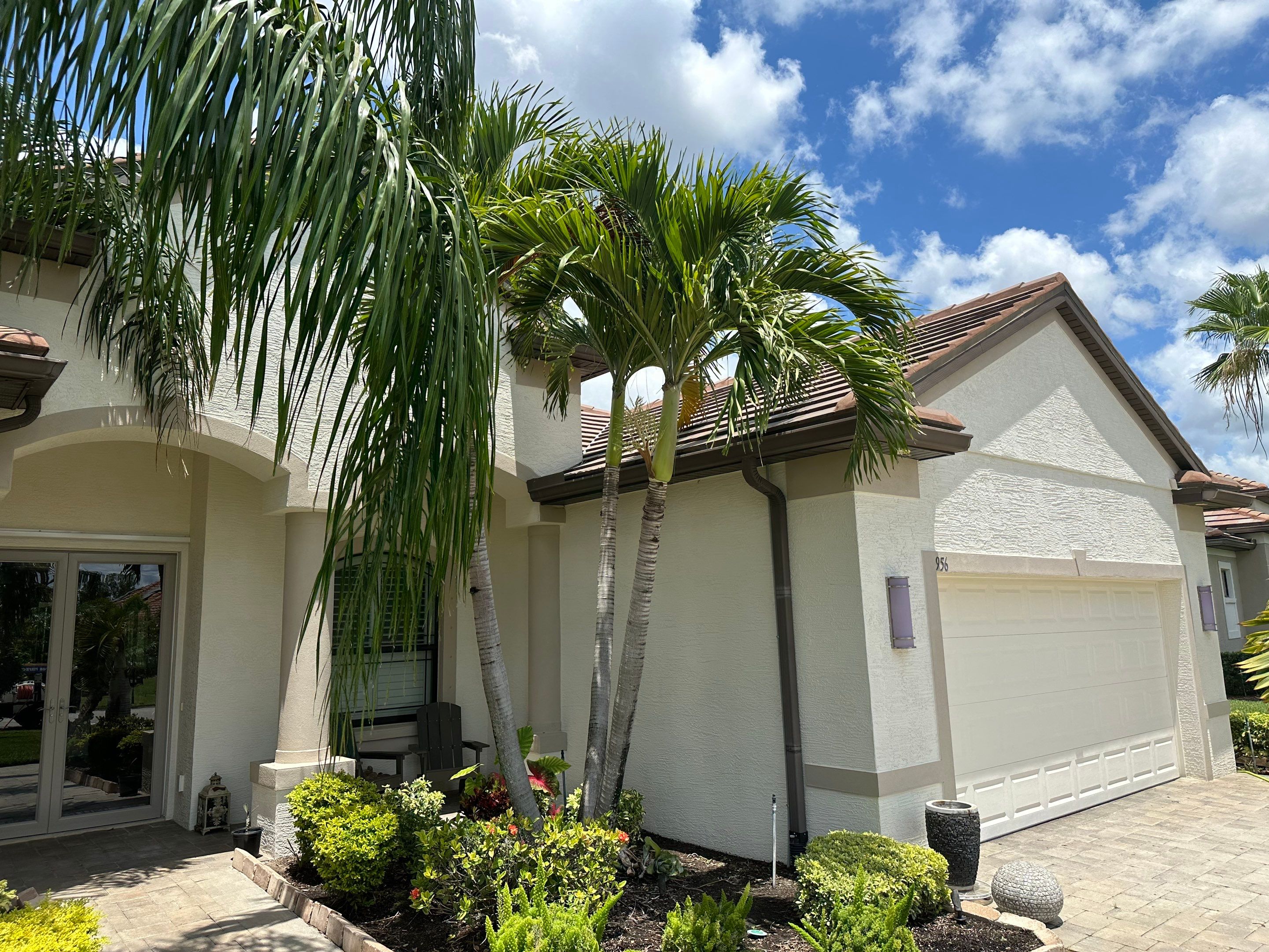 Flat Tile Roof Cleaning, House Wash & Sidewalk Cleaning in Enclave at Country Meadows, Bradenton, FL | Sunshine AquaWash by Sunshine AquaWash