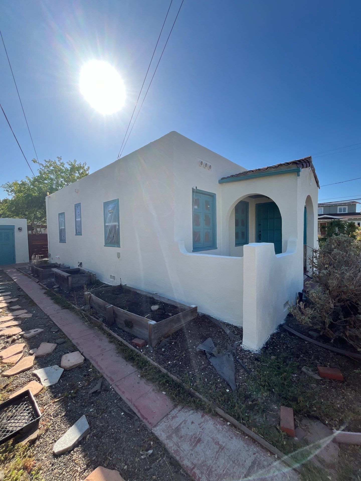 Exterior Transformation with Fresh Stucco and elastomeric system for waterproofing by Herrera’s Bay Area Painting inc.