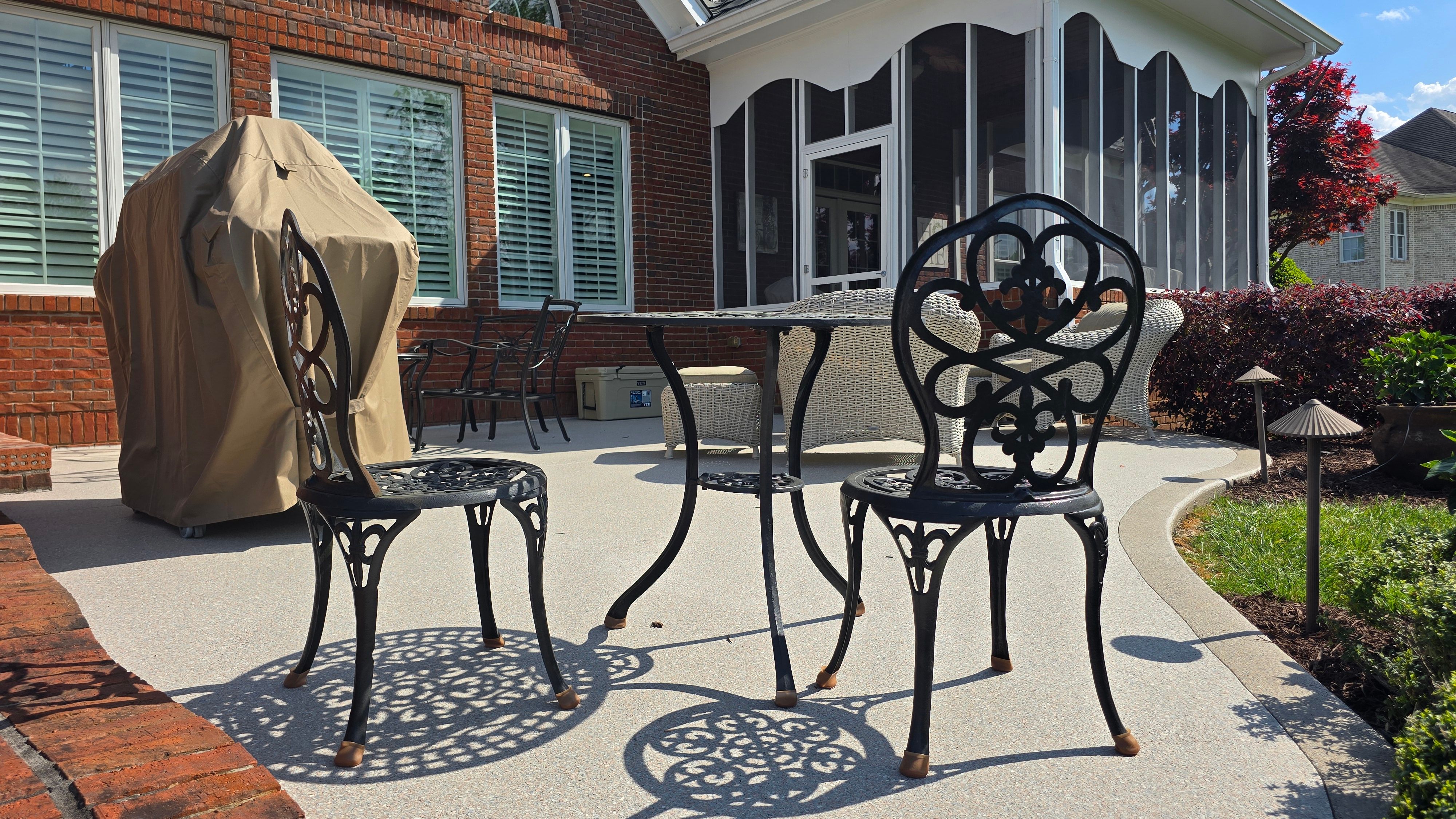Patio in Pumice with Obsidian Border  by Elite Floor Solutions