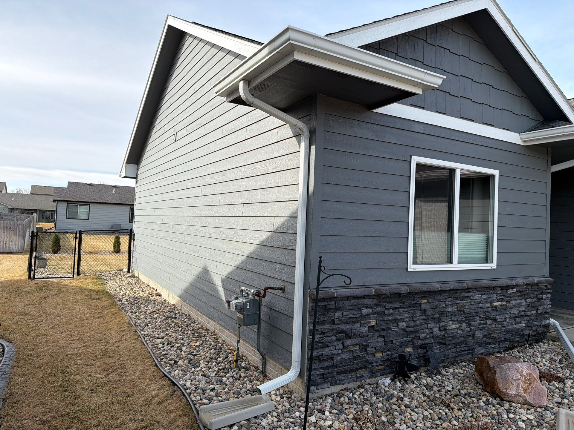 Residential Exterior Painting and Siding Refresh in Sioux Falls by Select Painting, Coatings & Garage Cabinets