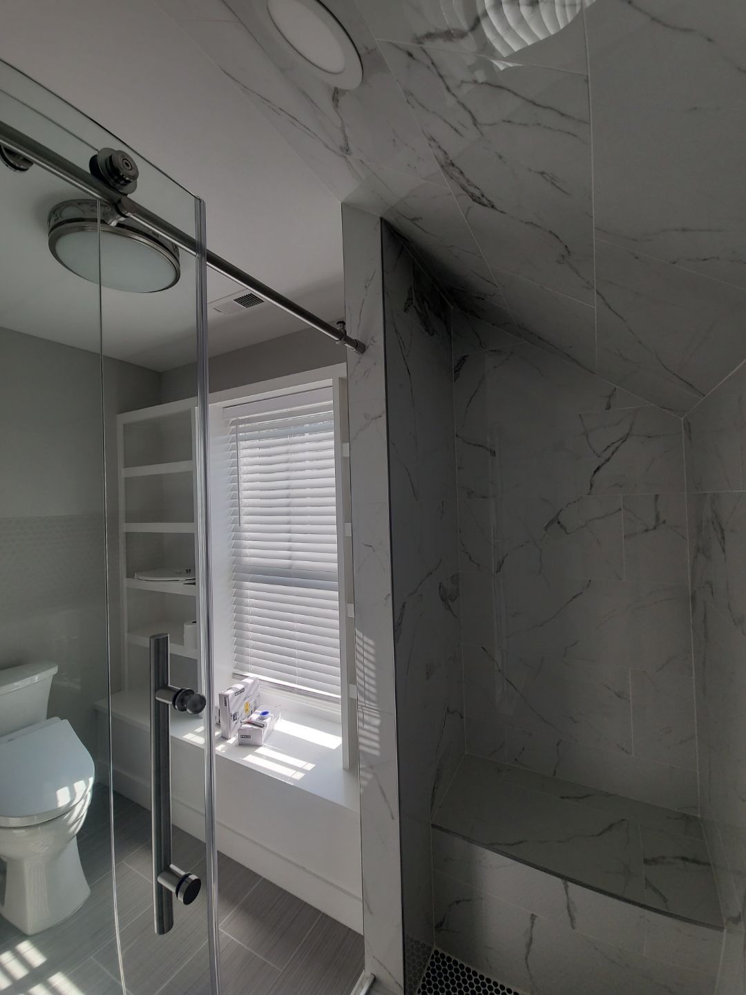 From Rafters to Retreat: An Attic Transformed with a Luxe Bath Escape by Elite Remodeling and Design LLC