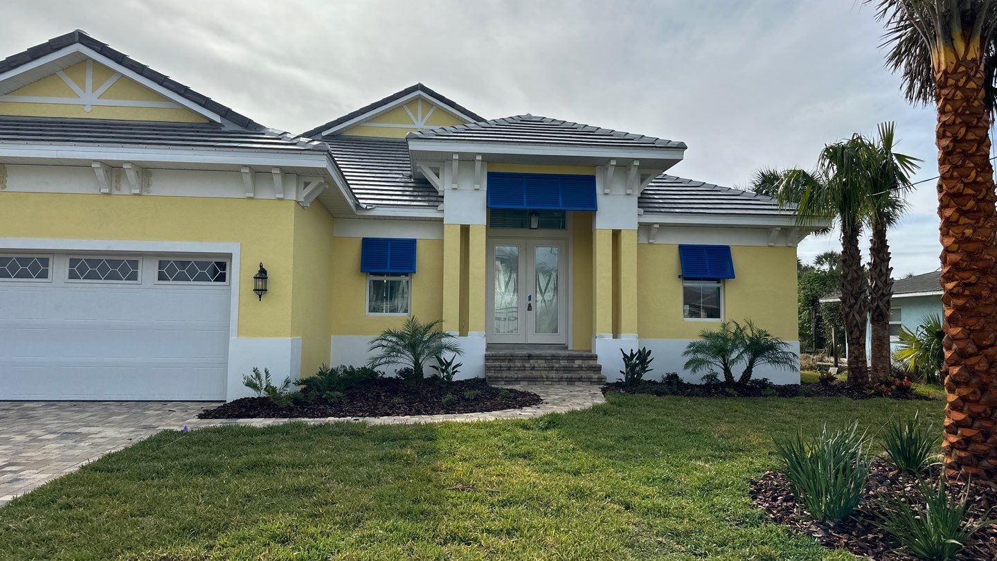 Bahama Shutters in Traffic Blue by Smart Guard Shutters