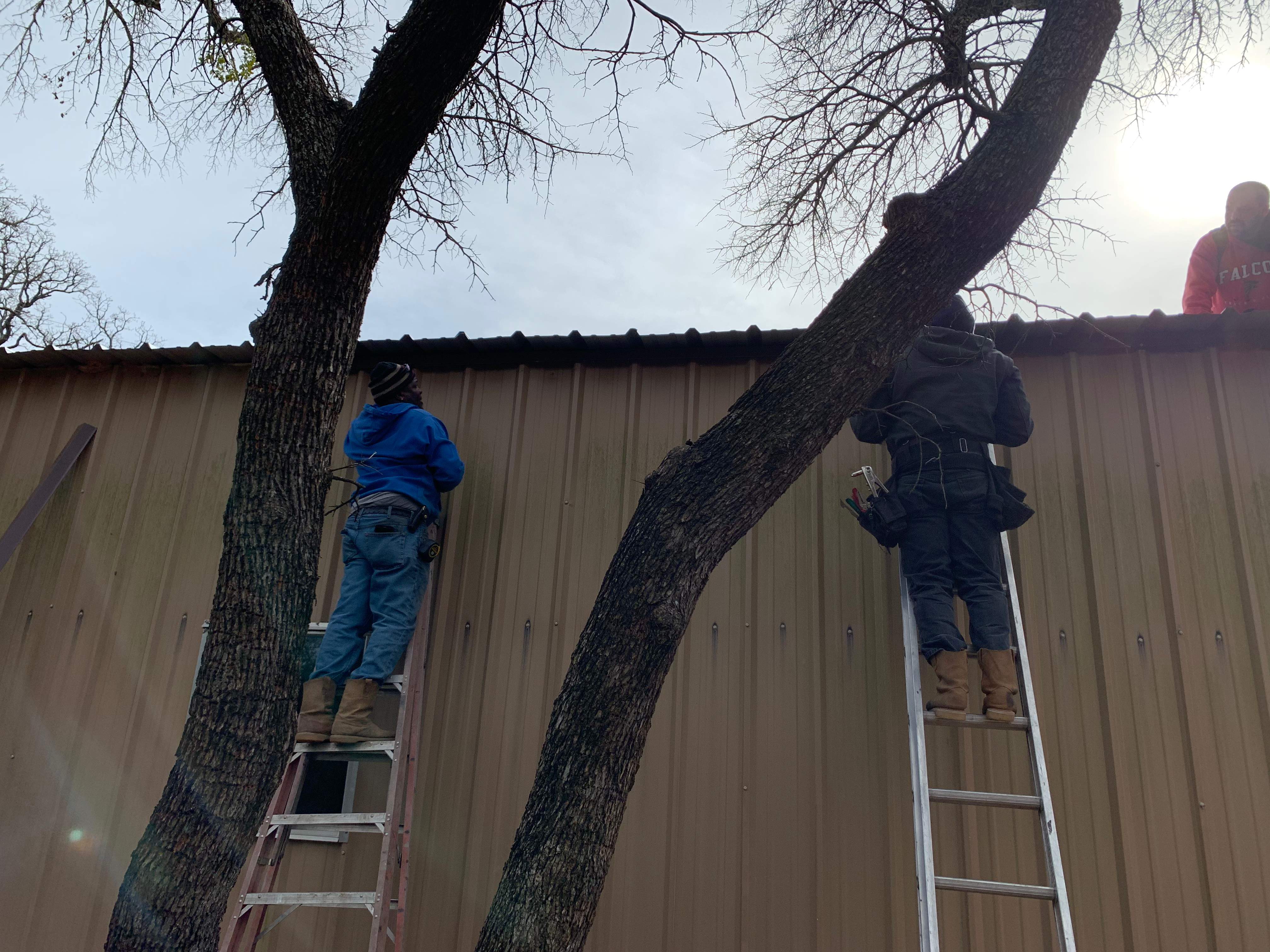 Install new R Panel Metal Roof at a Clients Farm house by First United Roofing & Construction