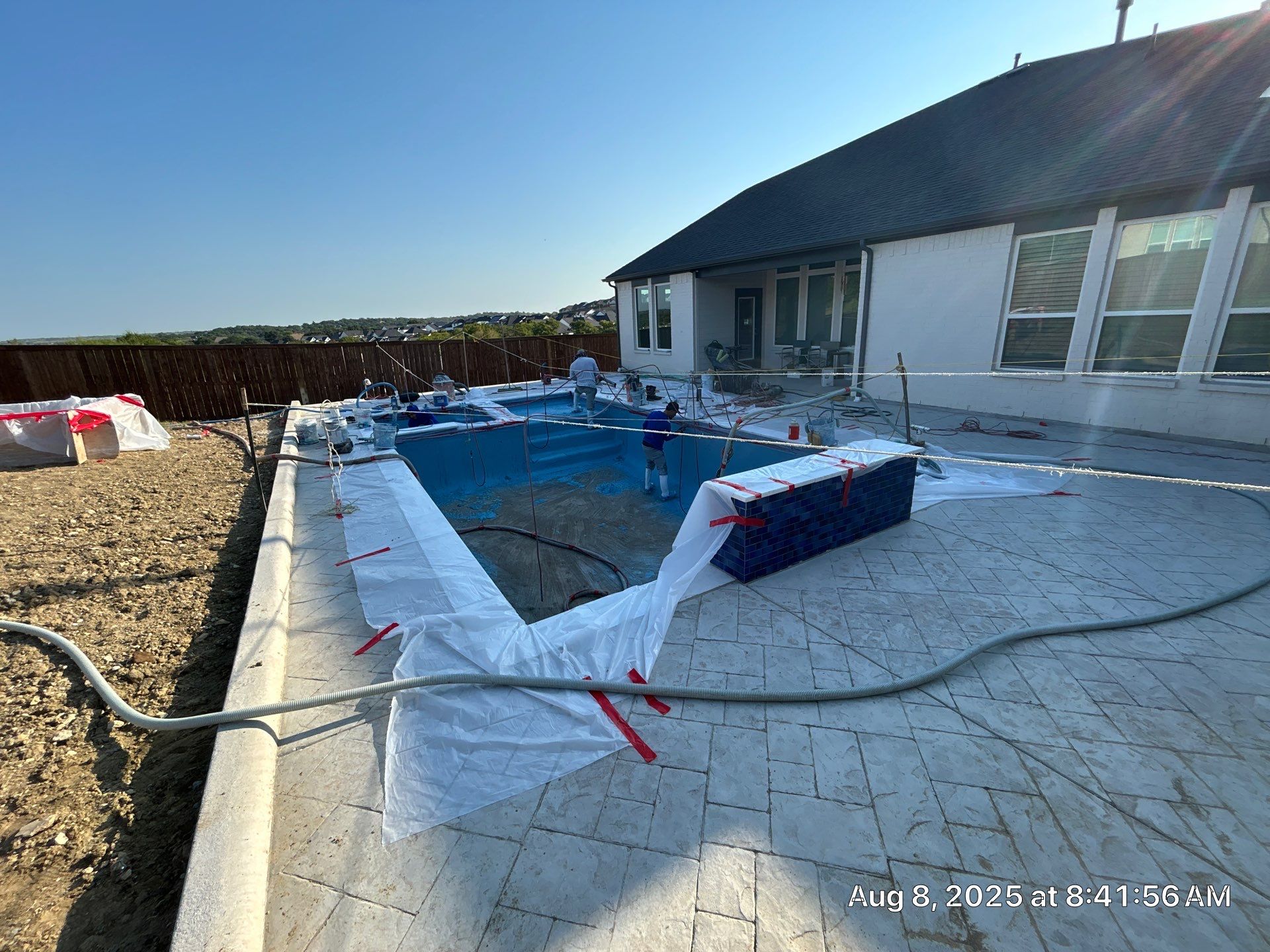 Geometric Pool with Raised Spa and Tanning Ledge by Pinnacle Pools and Spas - DFW